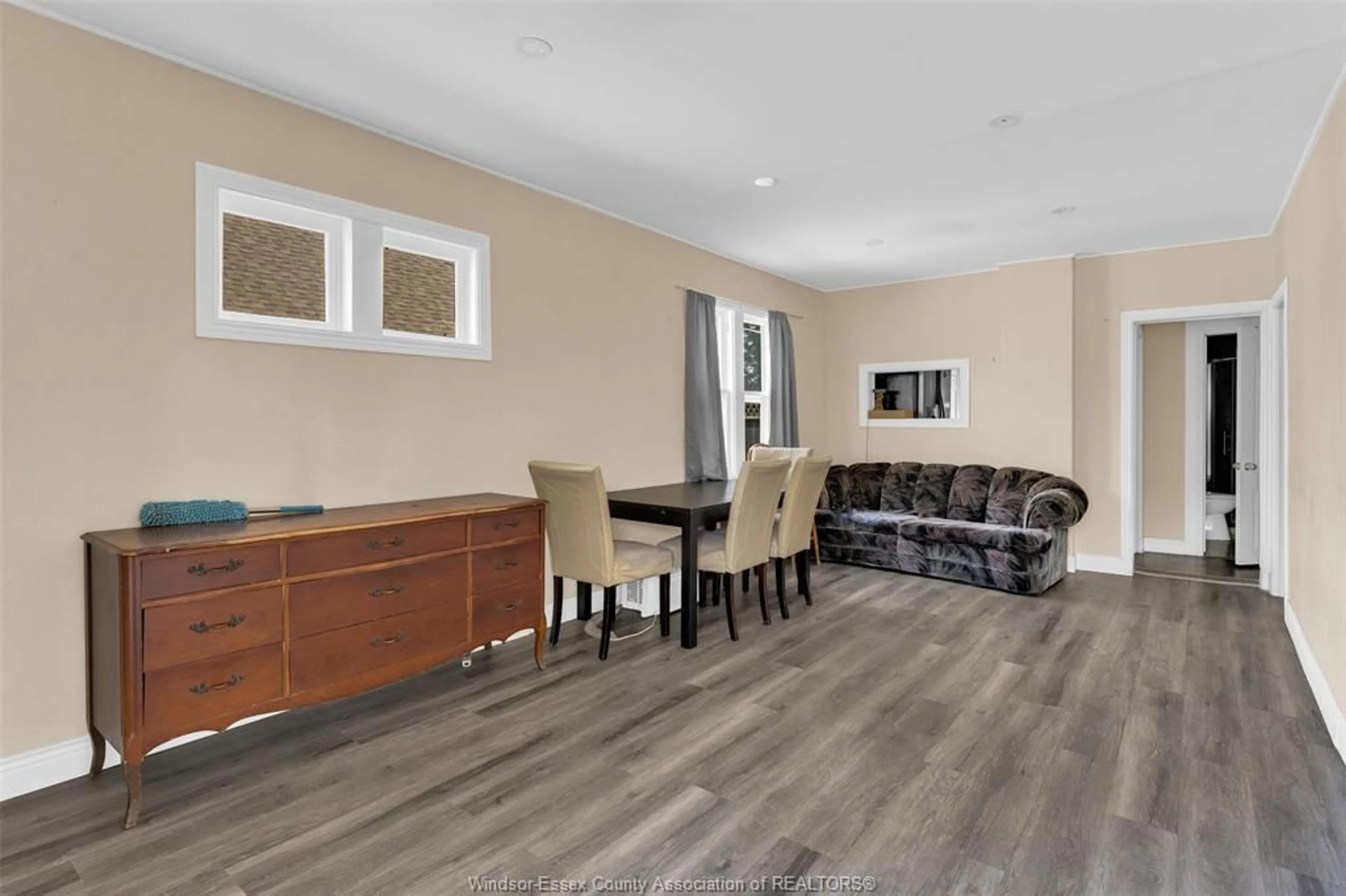 Living room with furniture, wood/laminate floor for 1747 South Cameron, Windsor Ontario N9B 3C9