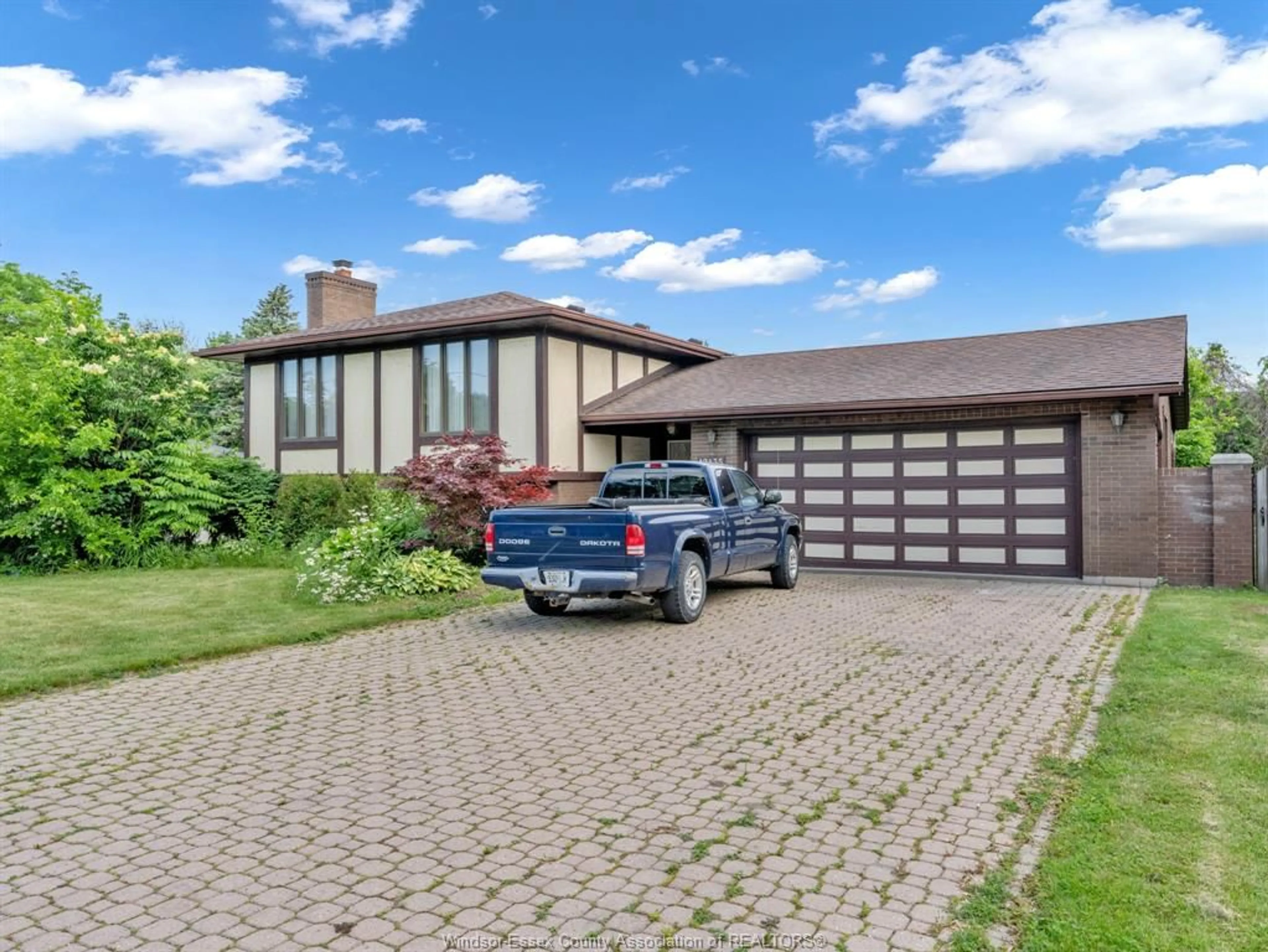 Home with brick exterior material, street for 12135 INTERSECTION Rd, Tecumseh Ontario N8N 1R4