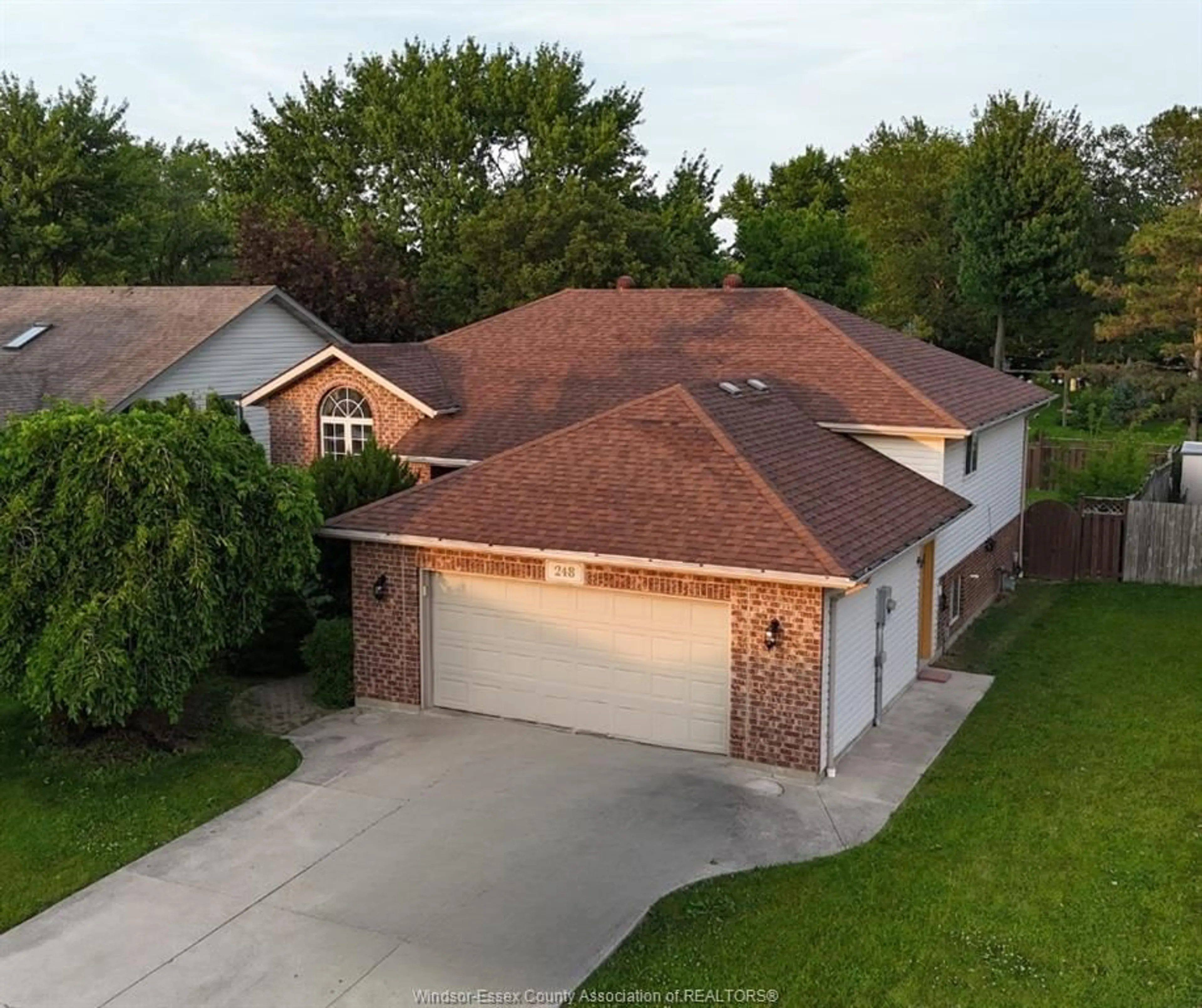 A pic from outside/outdoor area/front of a property/back of a property/a pic from drone, street for 248 WILLOWWOOD Dr, Lakeshore Ontario N0R 1A0