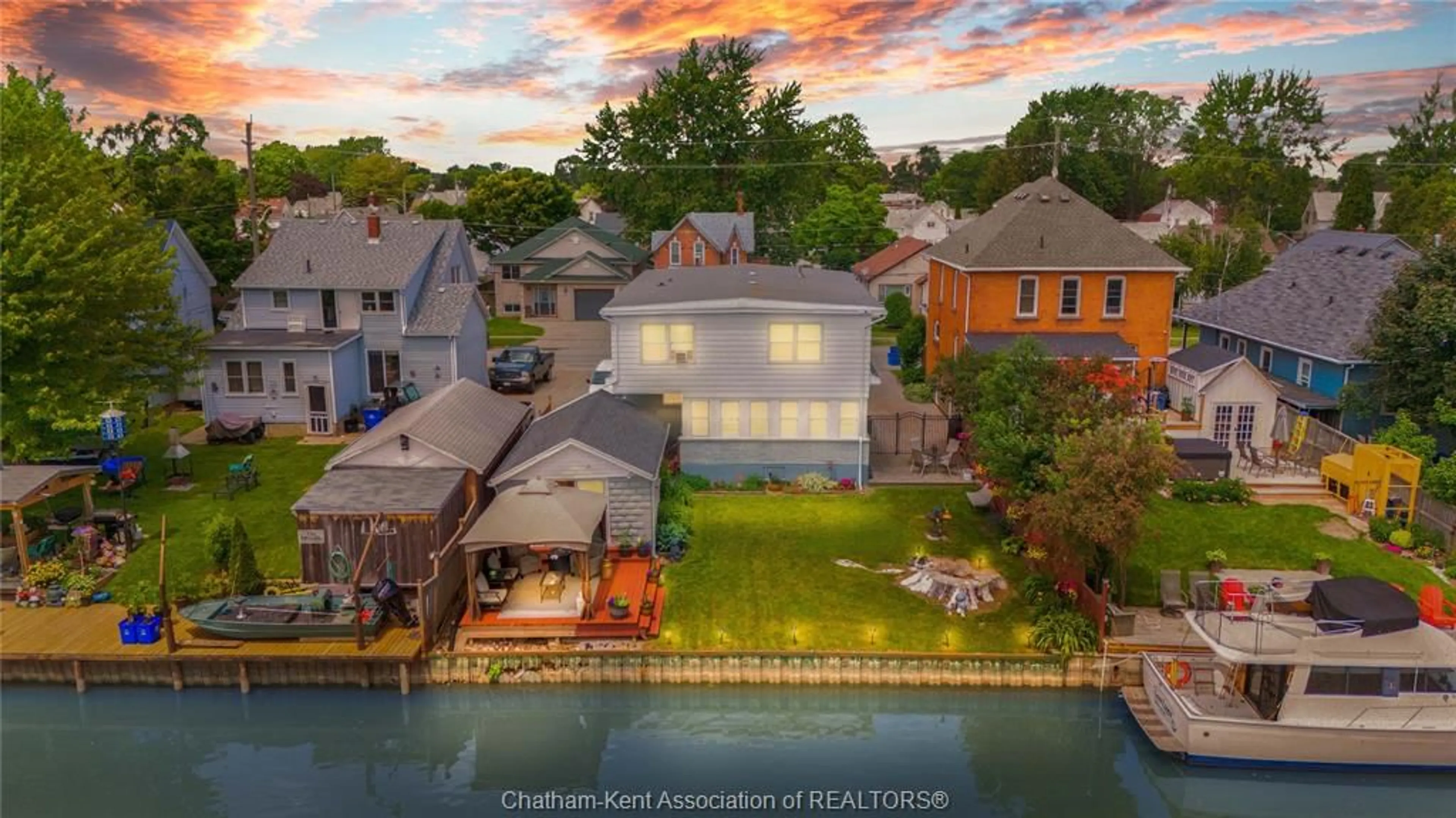 A pic from outside/outdoor area/front of a property/back of a property/a pic from drone, water/lake/river/ocean view for 1039 James St, Wallaceburg Ontario N8A 2P9