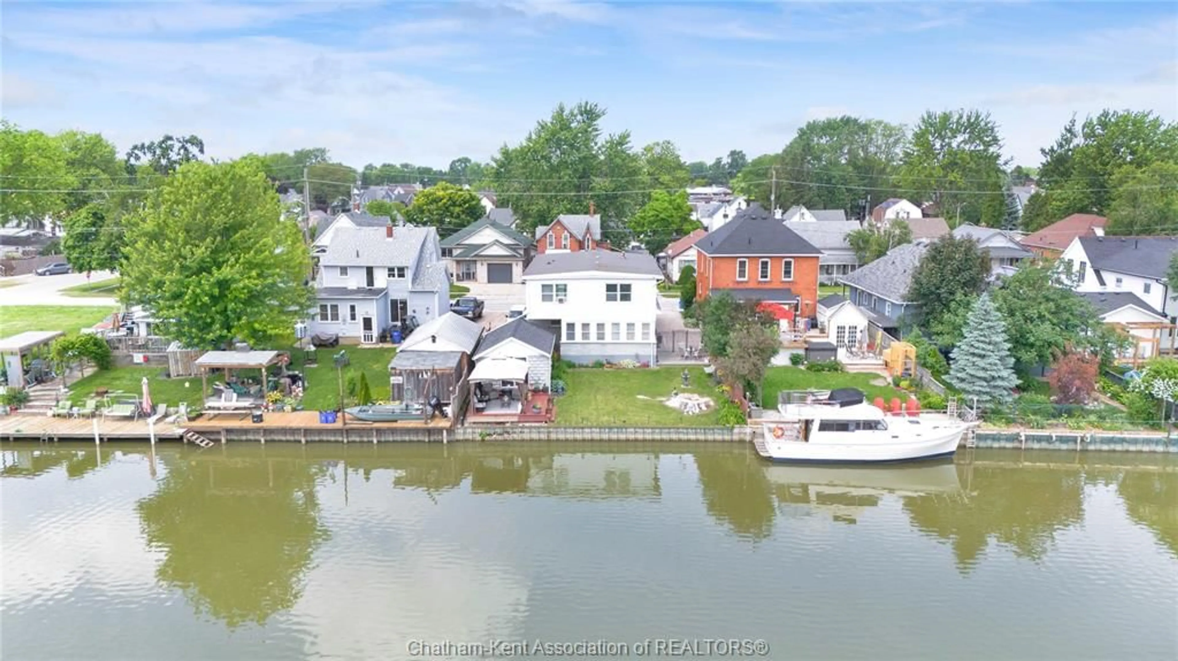 A pic from outside/outdoor area/front of a property/back of a property/a pic from drone, water/lake/river/ocean view for 1039 James St, Wallaceburg Ontario N8A 2P9