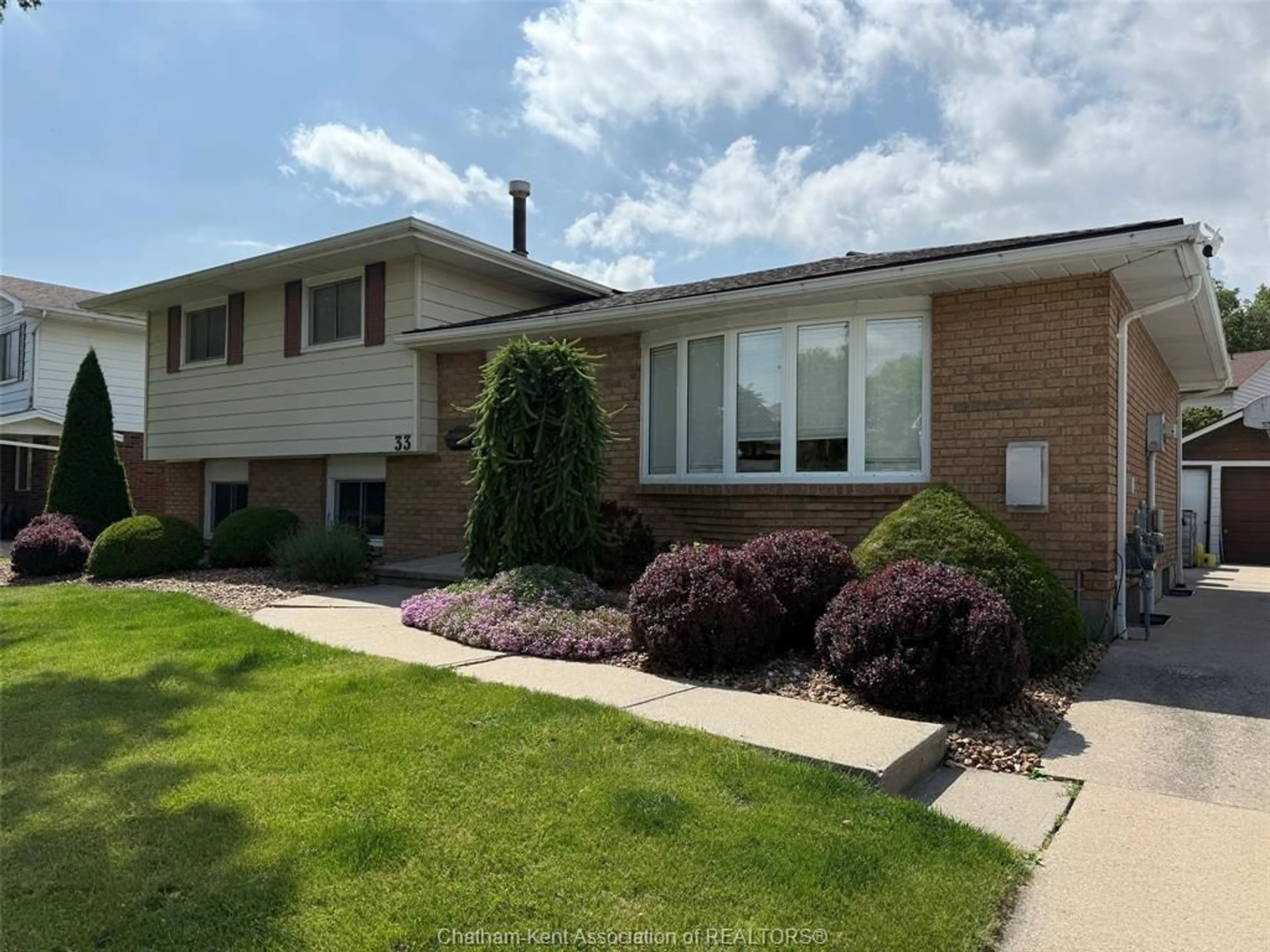 Home with brick exterior material, street for 33 Mount Pleasant Cres, Wallaceburg Ontario N8A 4X2