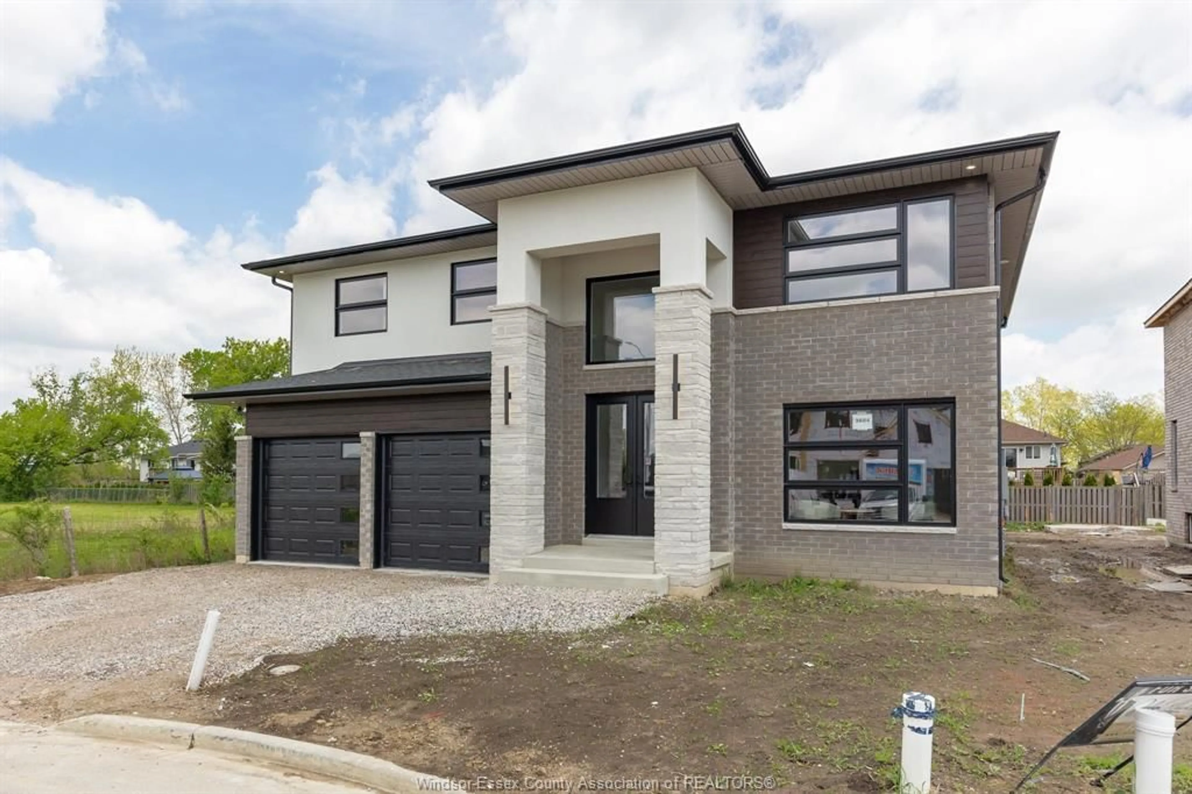 Home with brick exterior material, street for 3654 SUTTON Ave, Windsor Ontario N9E 0B3