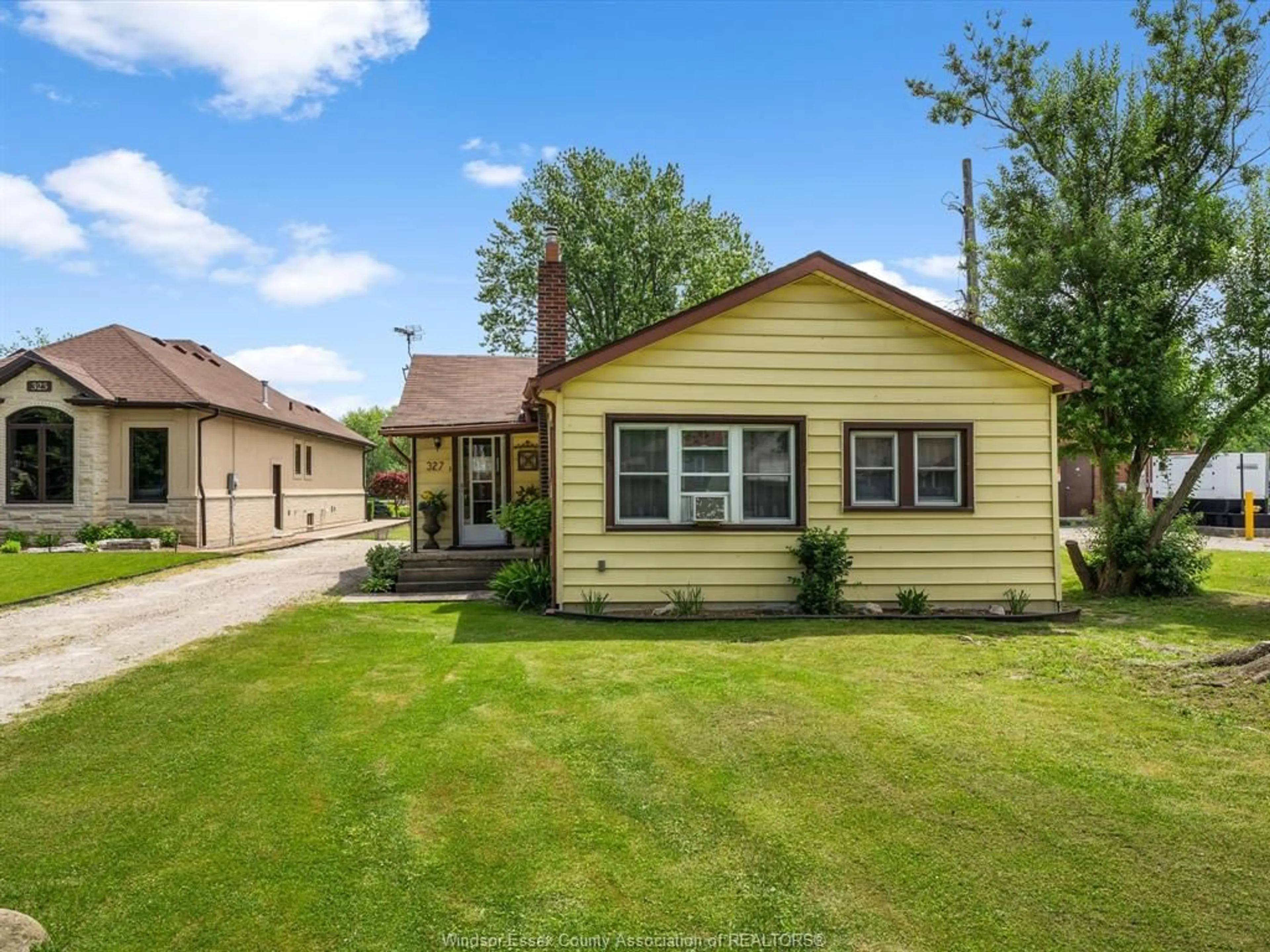 Home with vinyl exterior material, street for 327 W. BELLE RIVER Rd, Lakeshore Ontario N8L 1E4