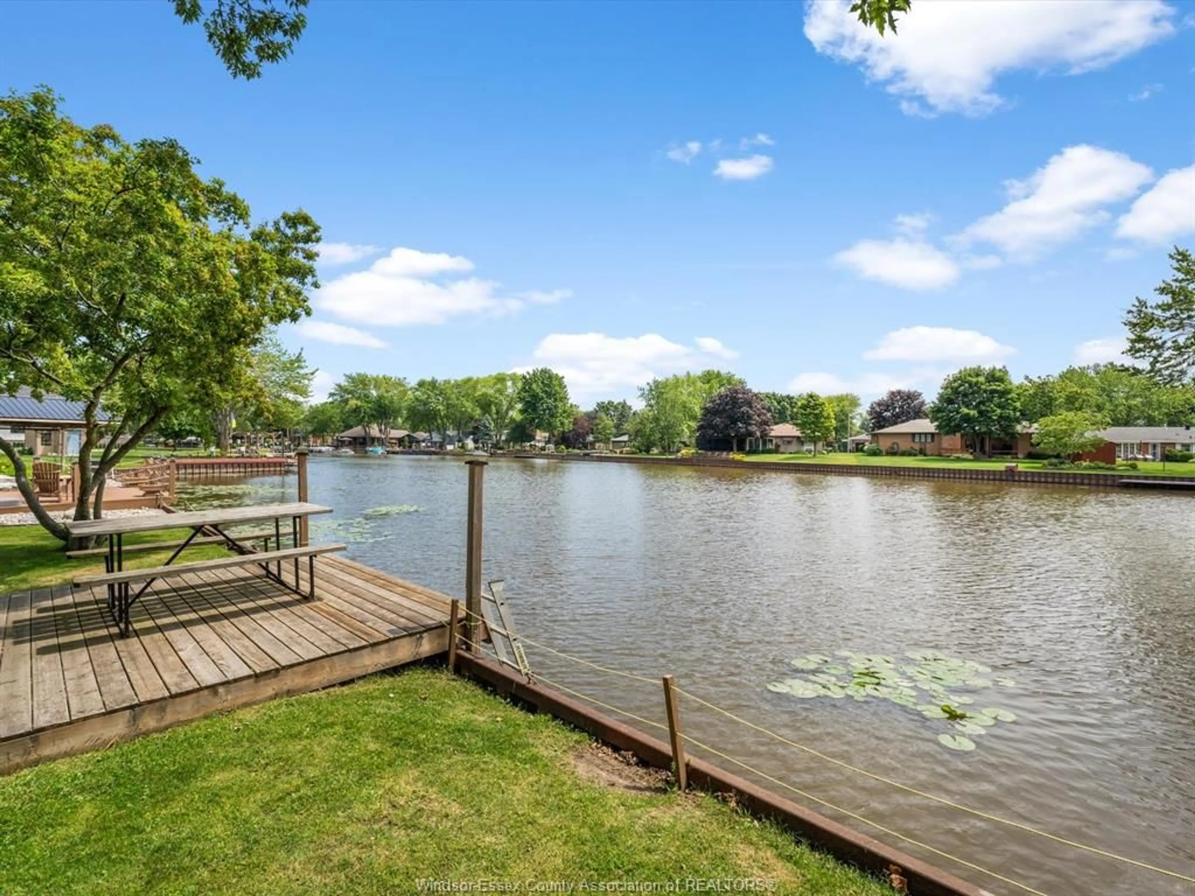 A pic from outside/outdoor area/front of a property/back of a property/a pic from drone, water/lake/river/ocean view for 327 W. BELLE RIVER Rd, Lakeshore Ontario N8L 1E4