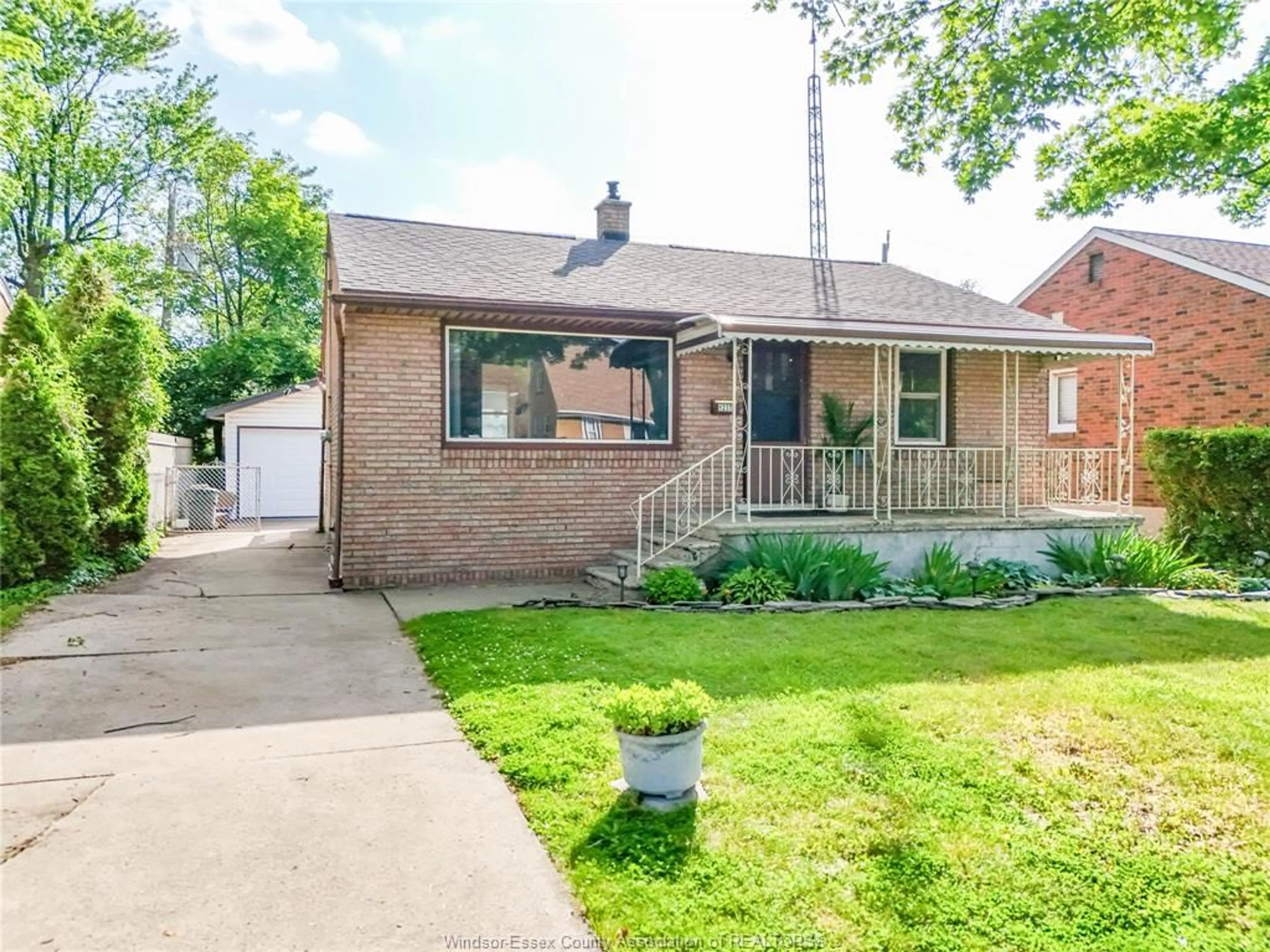 Home with brick exterior material, street for 1237 HARRISON Ave, Windsor Ontario N9C 3J4