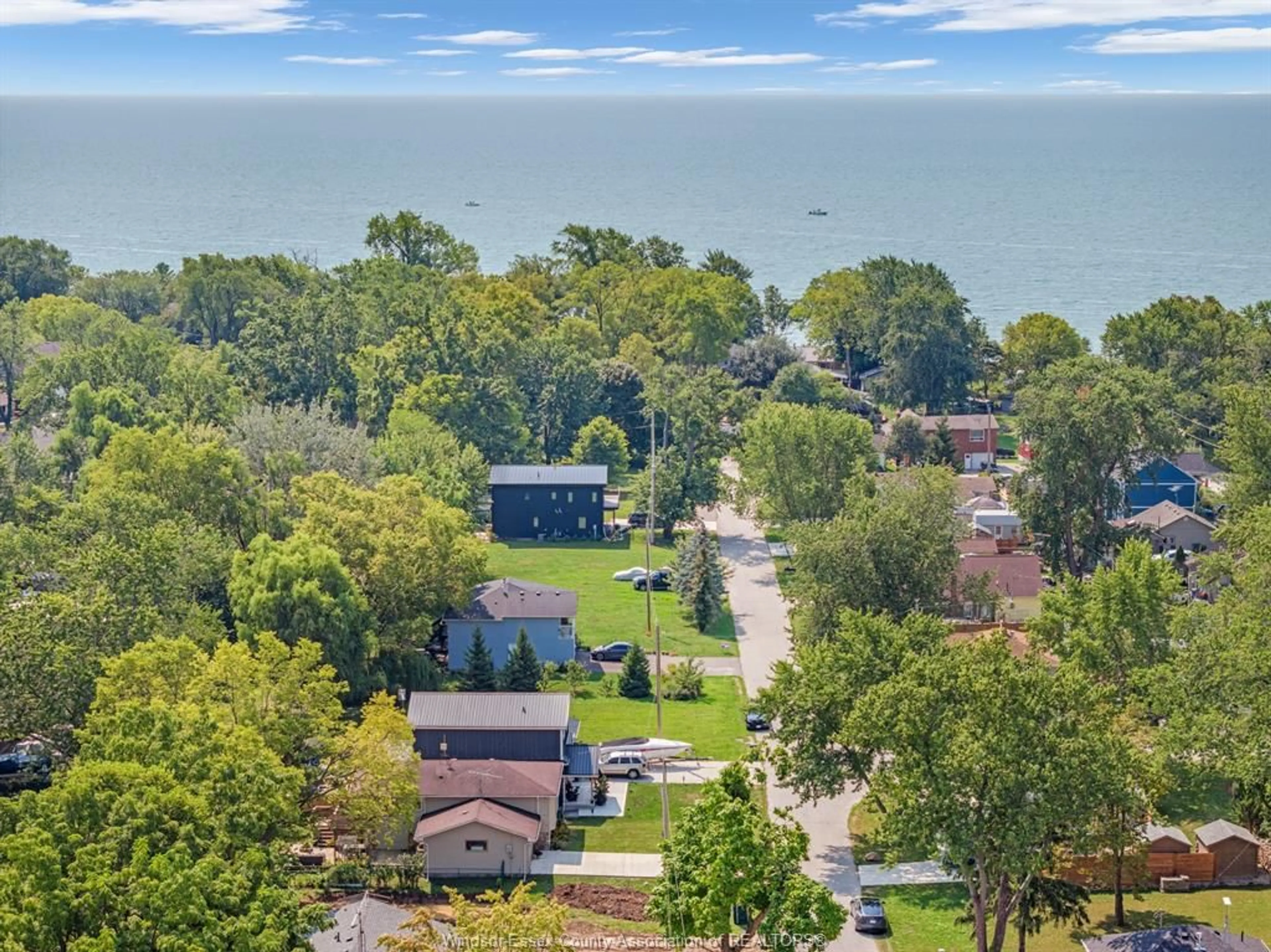 A pic from outside/outdoor area/front of a property/back of a property/a pic from drone, water/lake/river/ocean view for 128 BELLCREFT, Harrow Ontario N0R 1G0