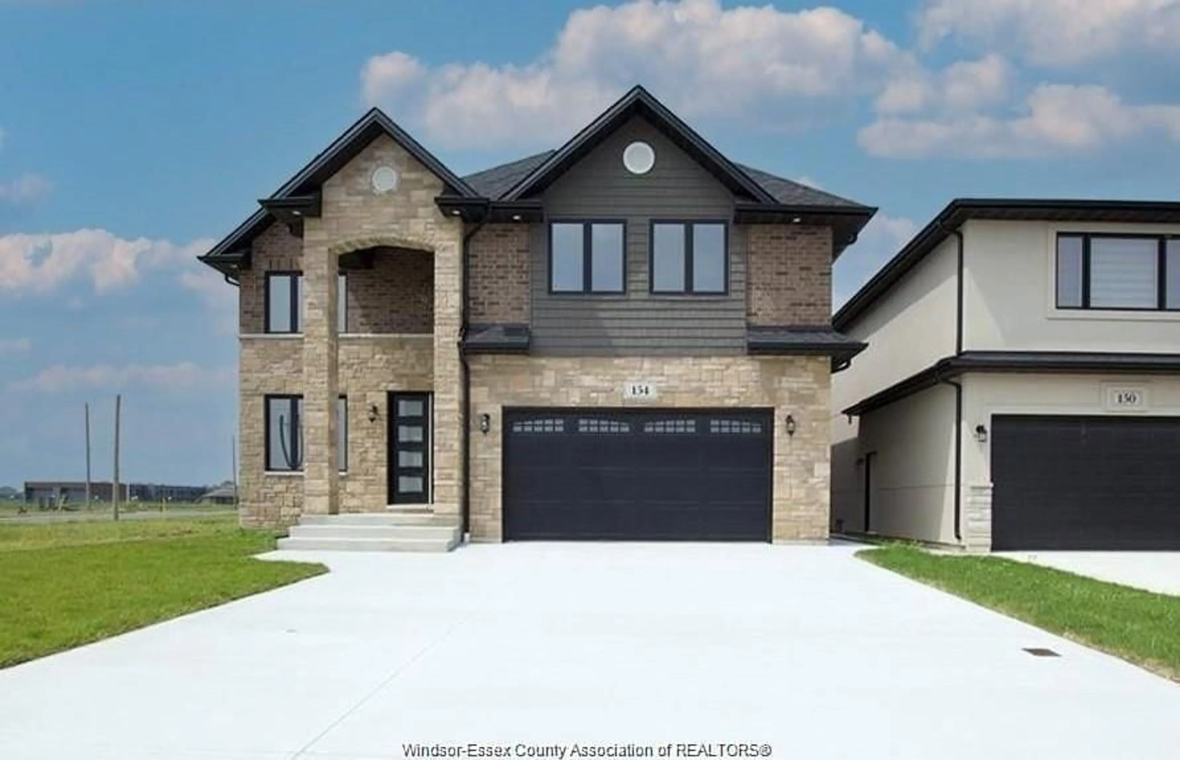 Home with brick exterior material, street for 154 TUSCANY Trail, Chatham Ontario N7M 6G2