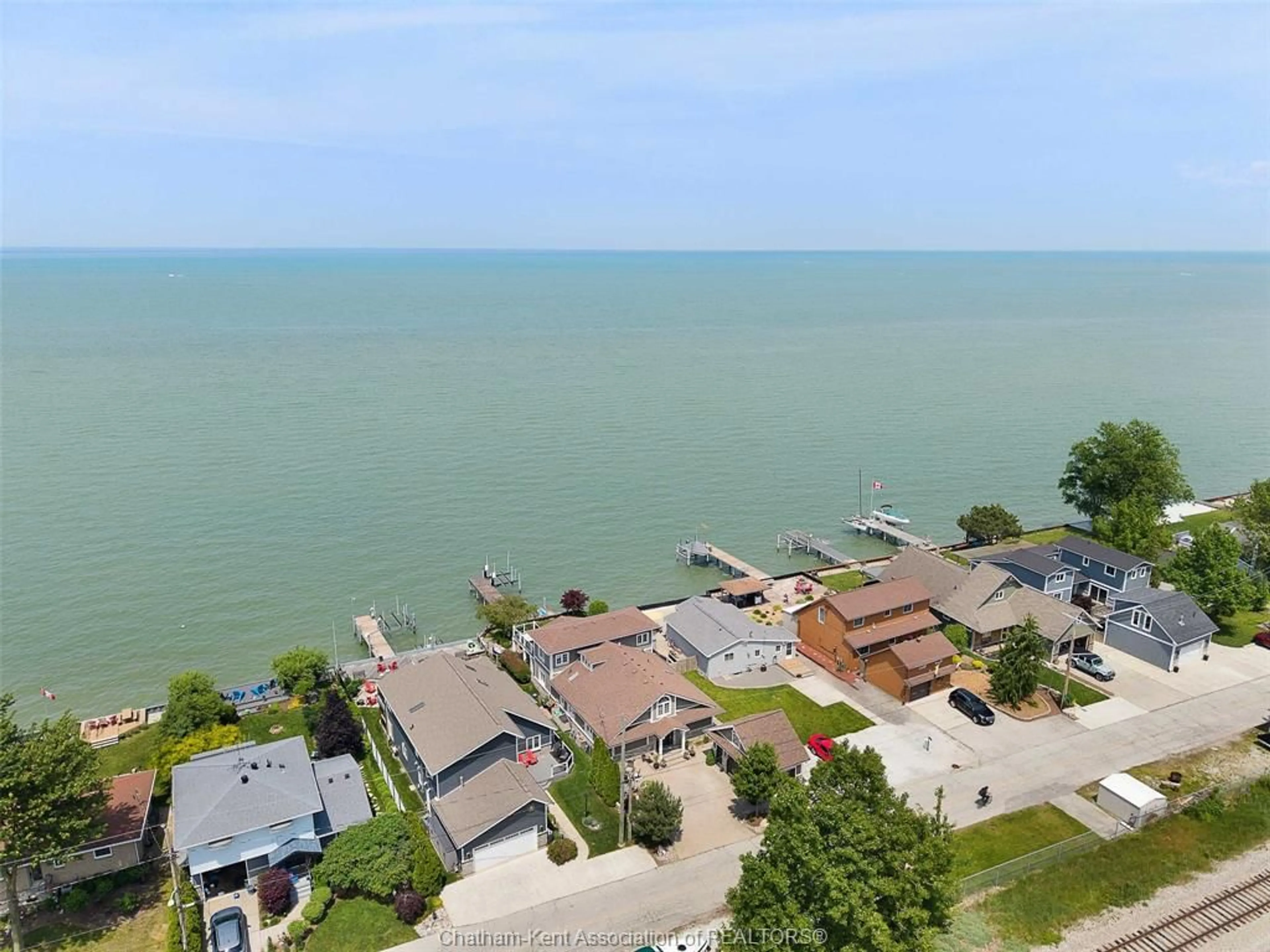 A pic from outside/outdoor area/front of a property/back of a property/a pic from drone, water/lake/river/ocean view for 1472 CAILLE Ave, Belle River Ontario N8L 0J2