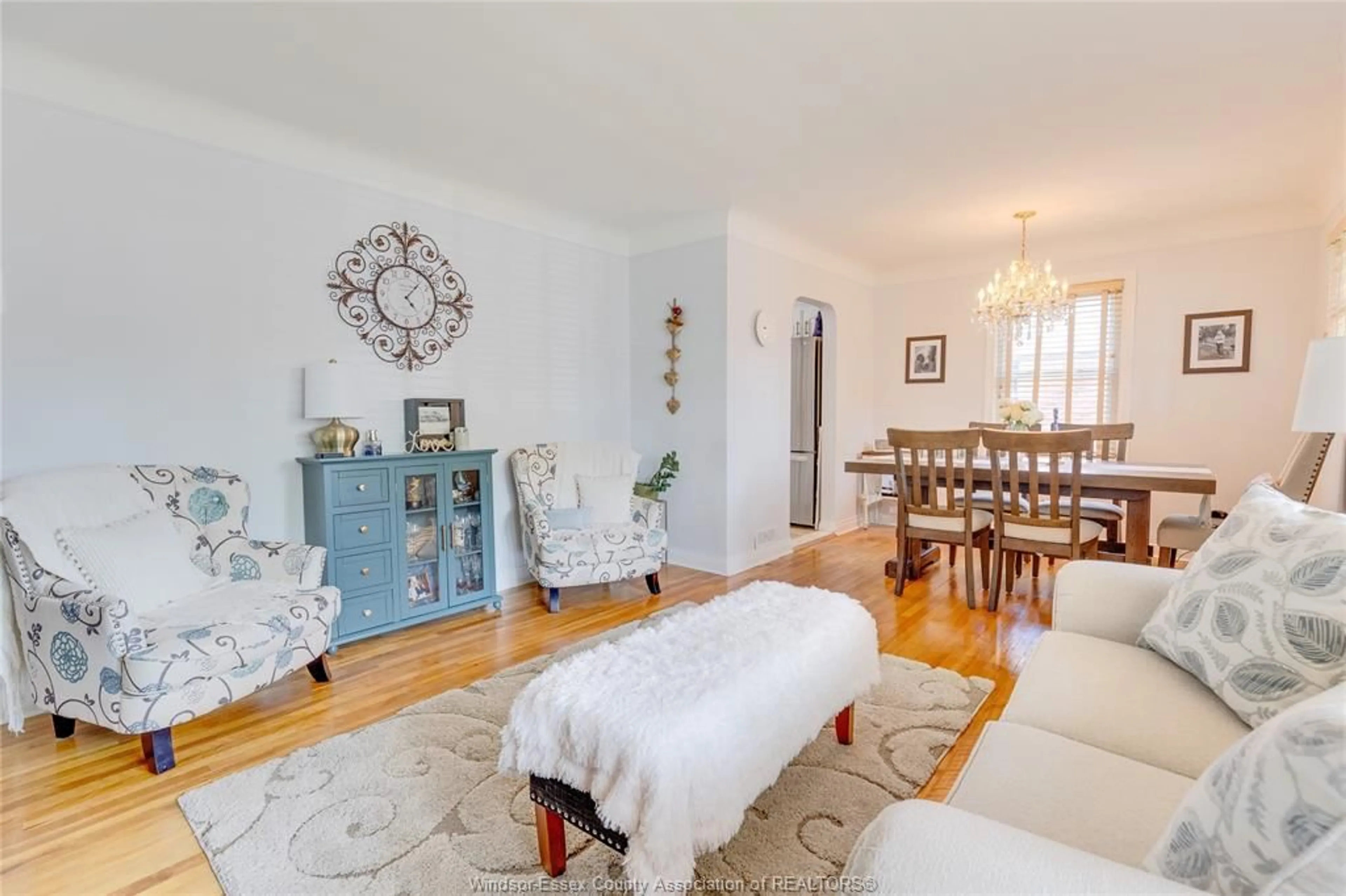 Living room with furniture, wood/laminate floor for 3222 Curry, Windsor Ontario N9E 2T5