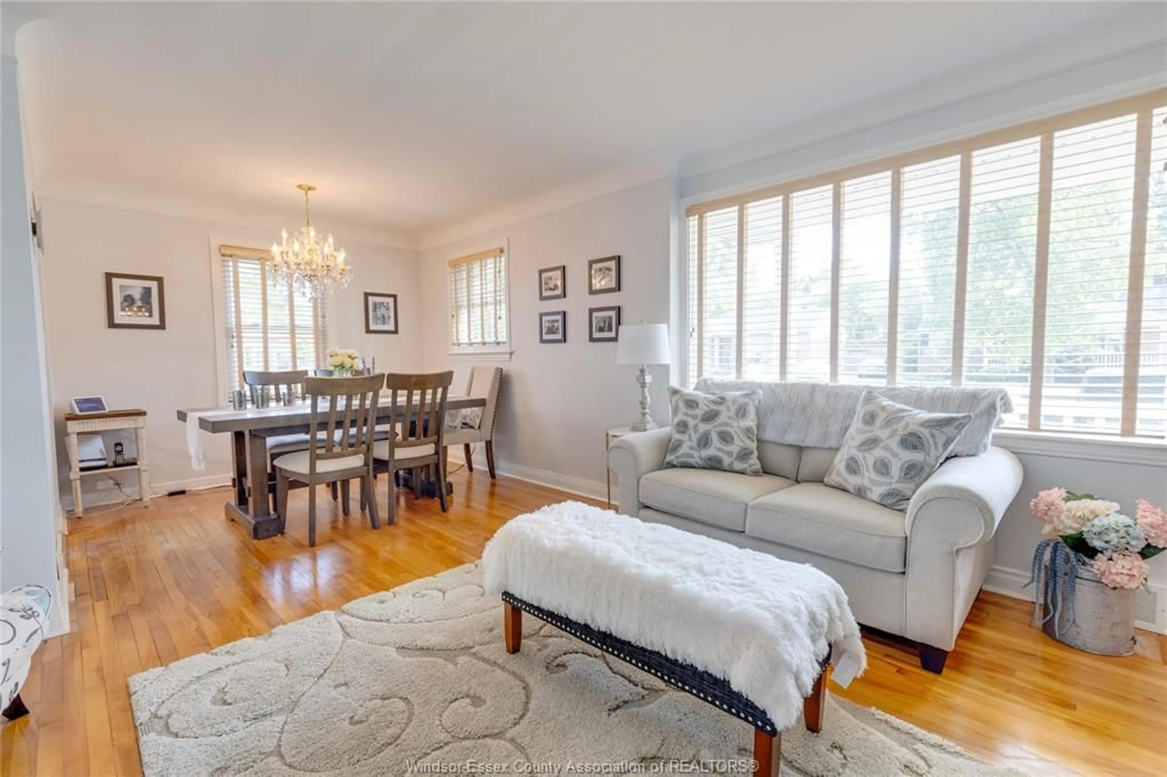 Living room with furniture, wood/laminate floor for 3222 Curry, Windsor Ontario N9E 2T5