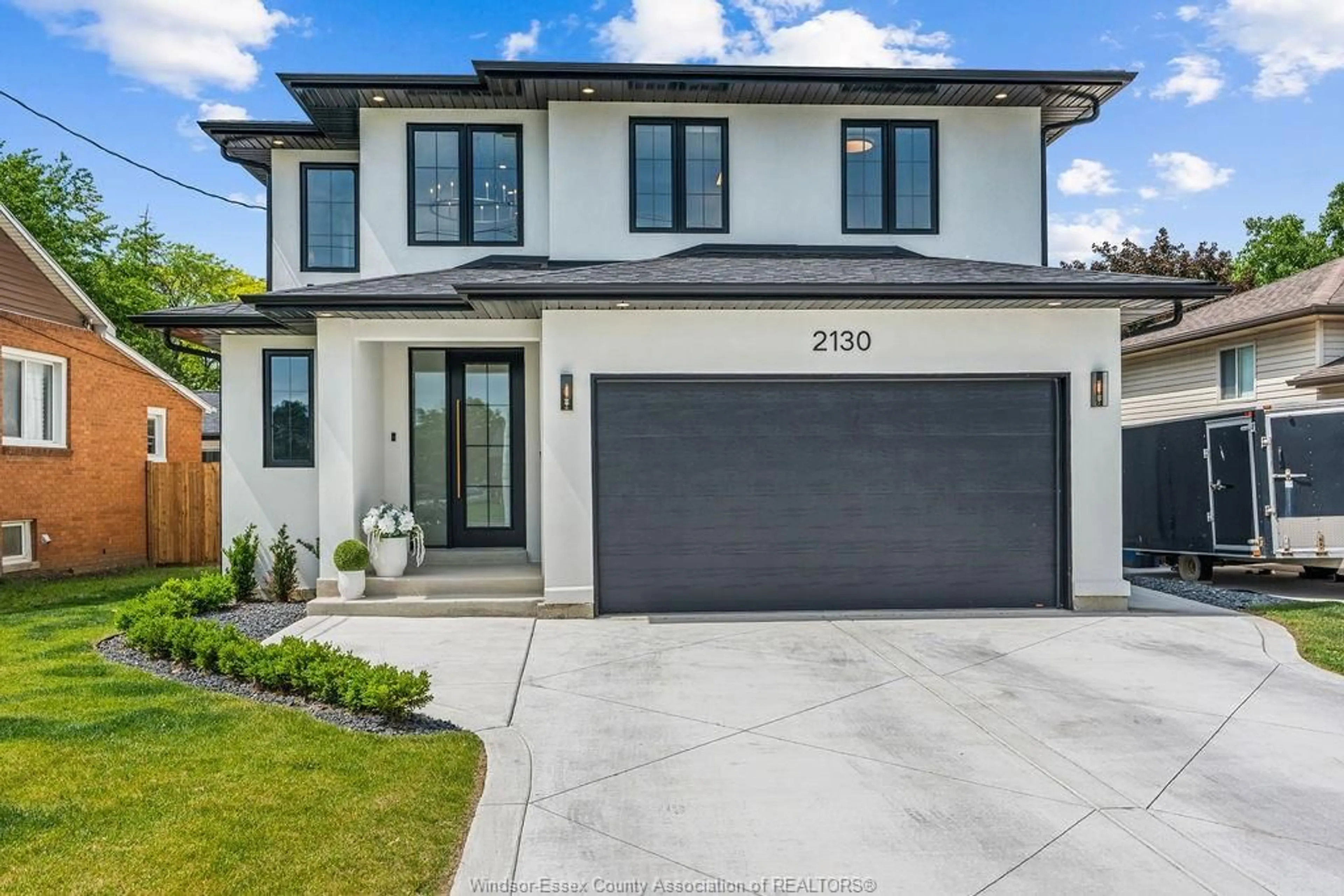 Home with vinyl exterior material, street for 2130 CABANA Rd, Windsor Ontario N9G 1E1