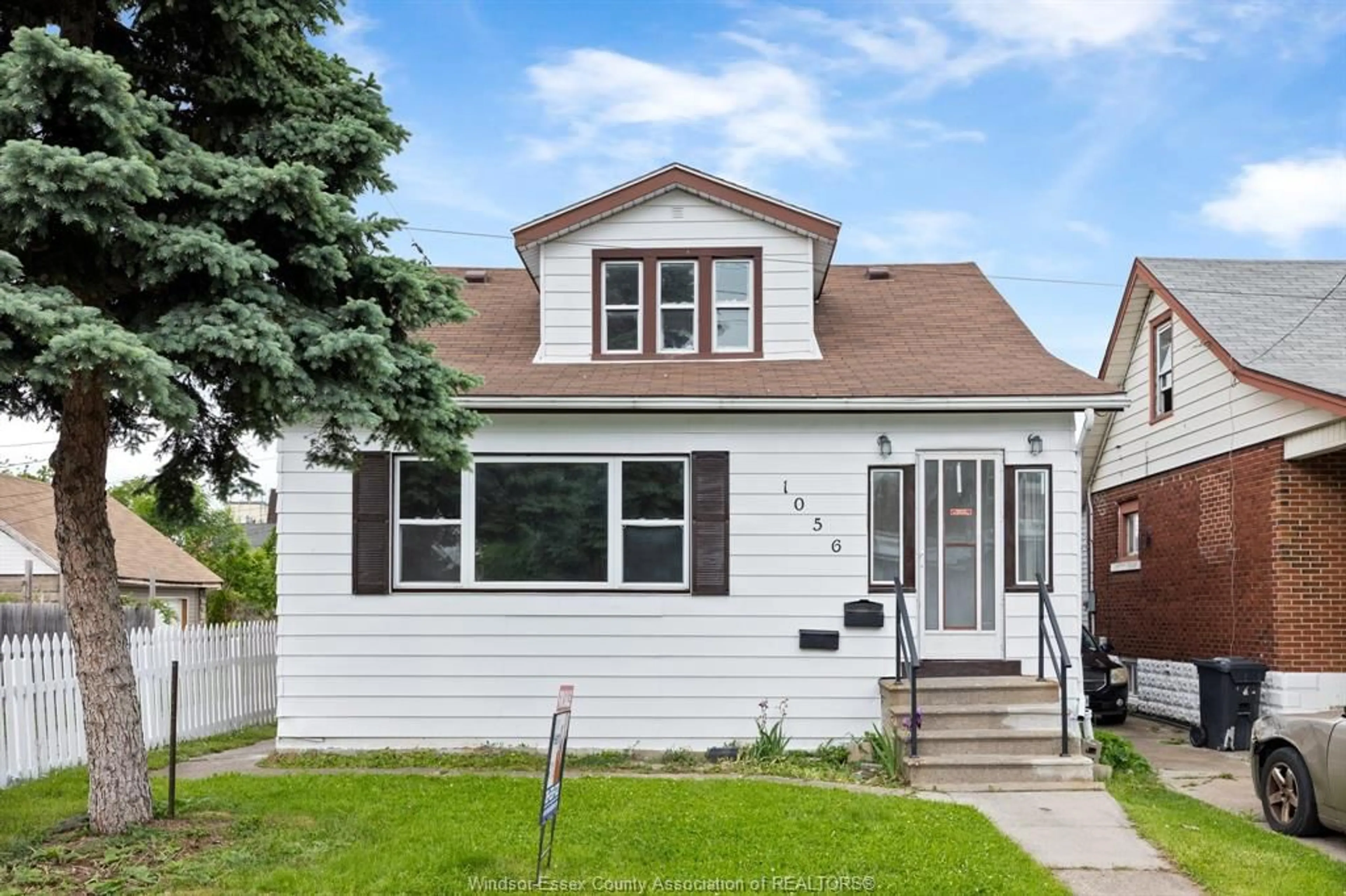 Home with vinyl exterior material, street for 1056 SHEPHERD St, Windsor Ontario N8X 2L7