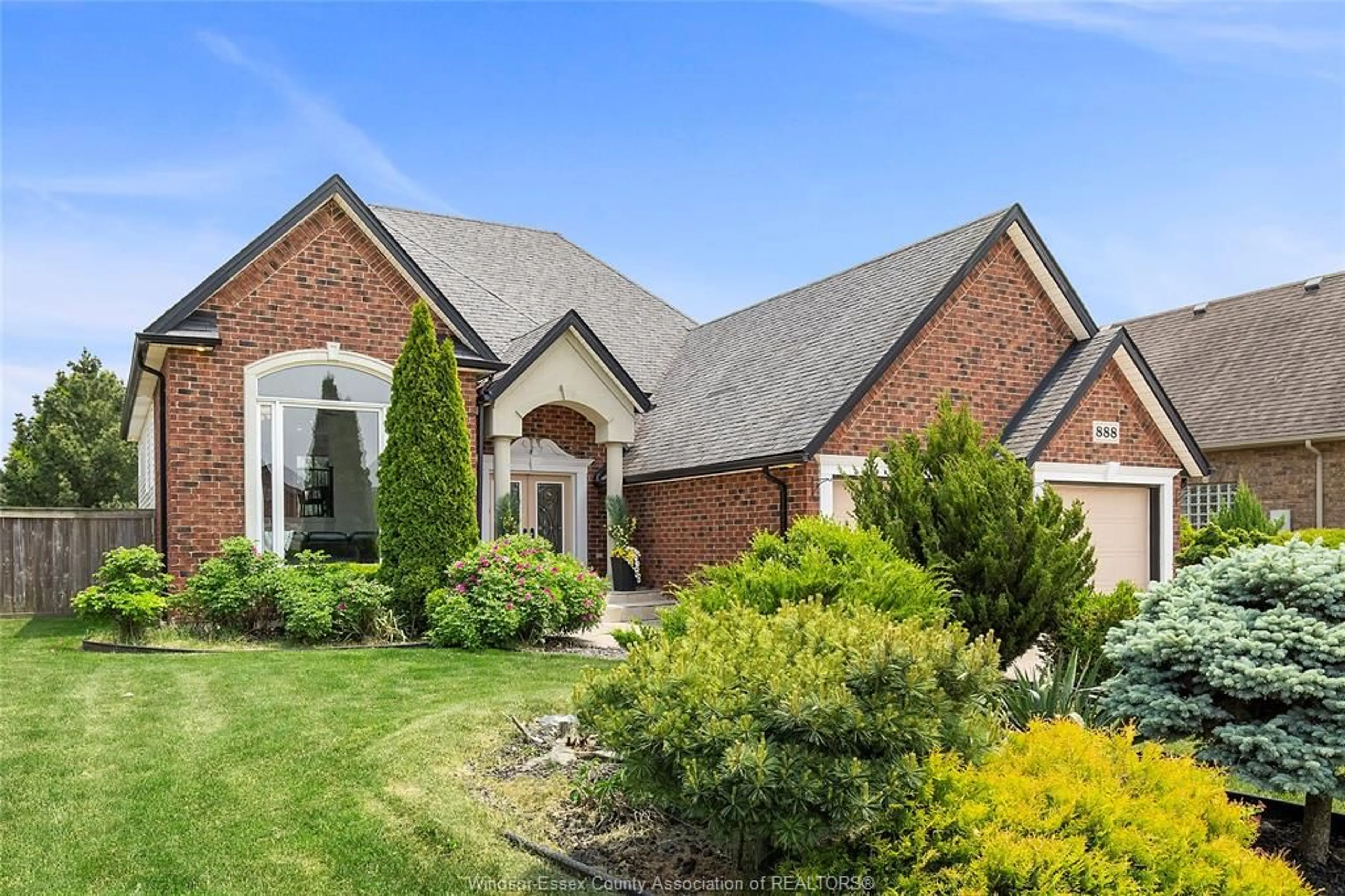Home with brick exterior material, street for 888 DRIFTWOOD Cres, Lakeshore Ontario N8L 1G4