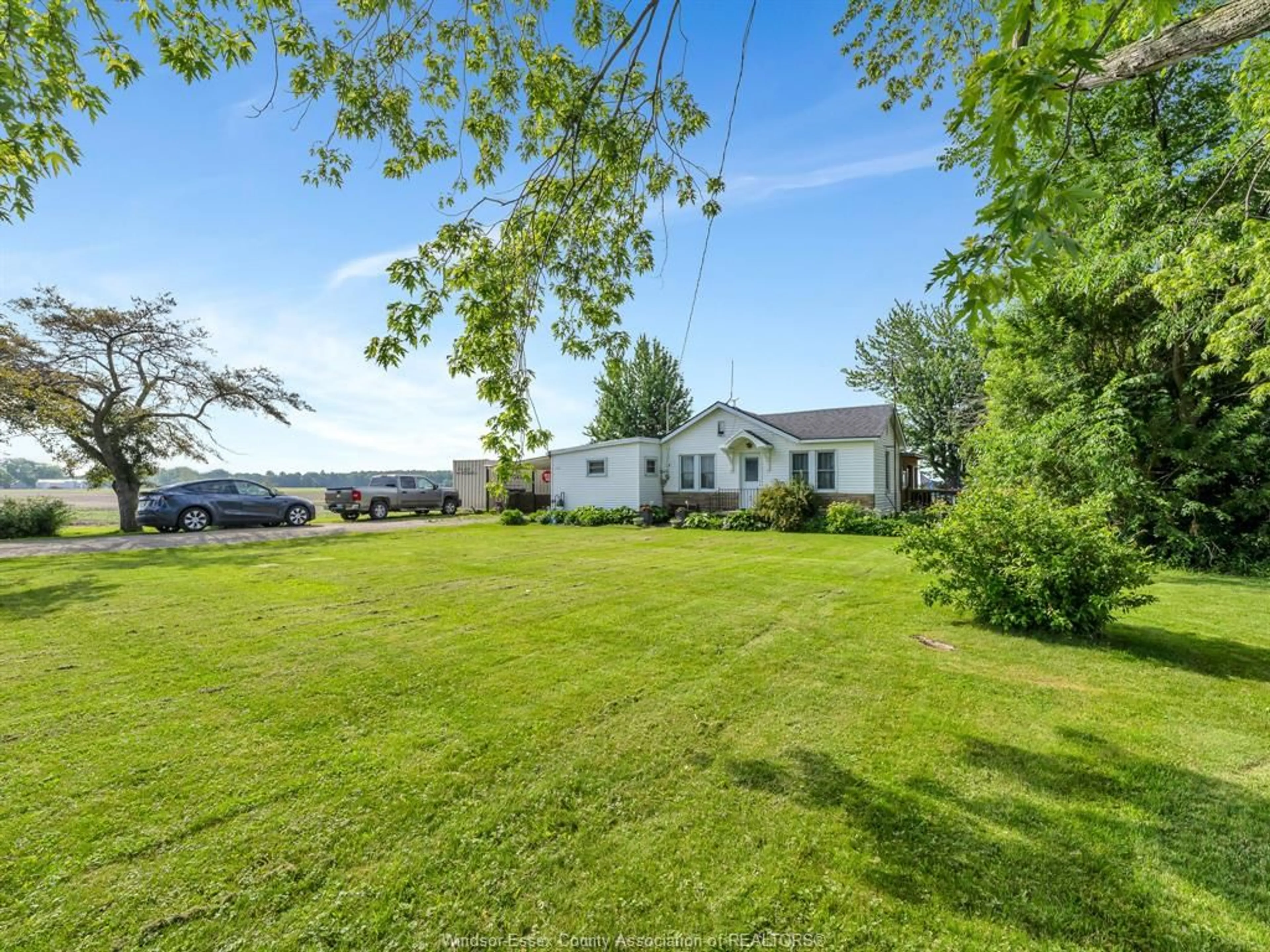 A pic from outside/outdoor area/front of a property/back of a property/a pic from drone, water/lake/river/ocean view for 1101 ROAD 2 WEST, Kingsville Ontario N9Y 2E4