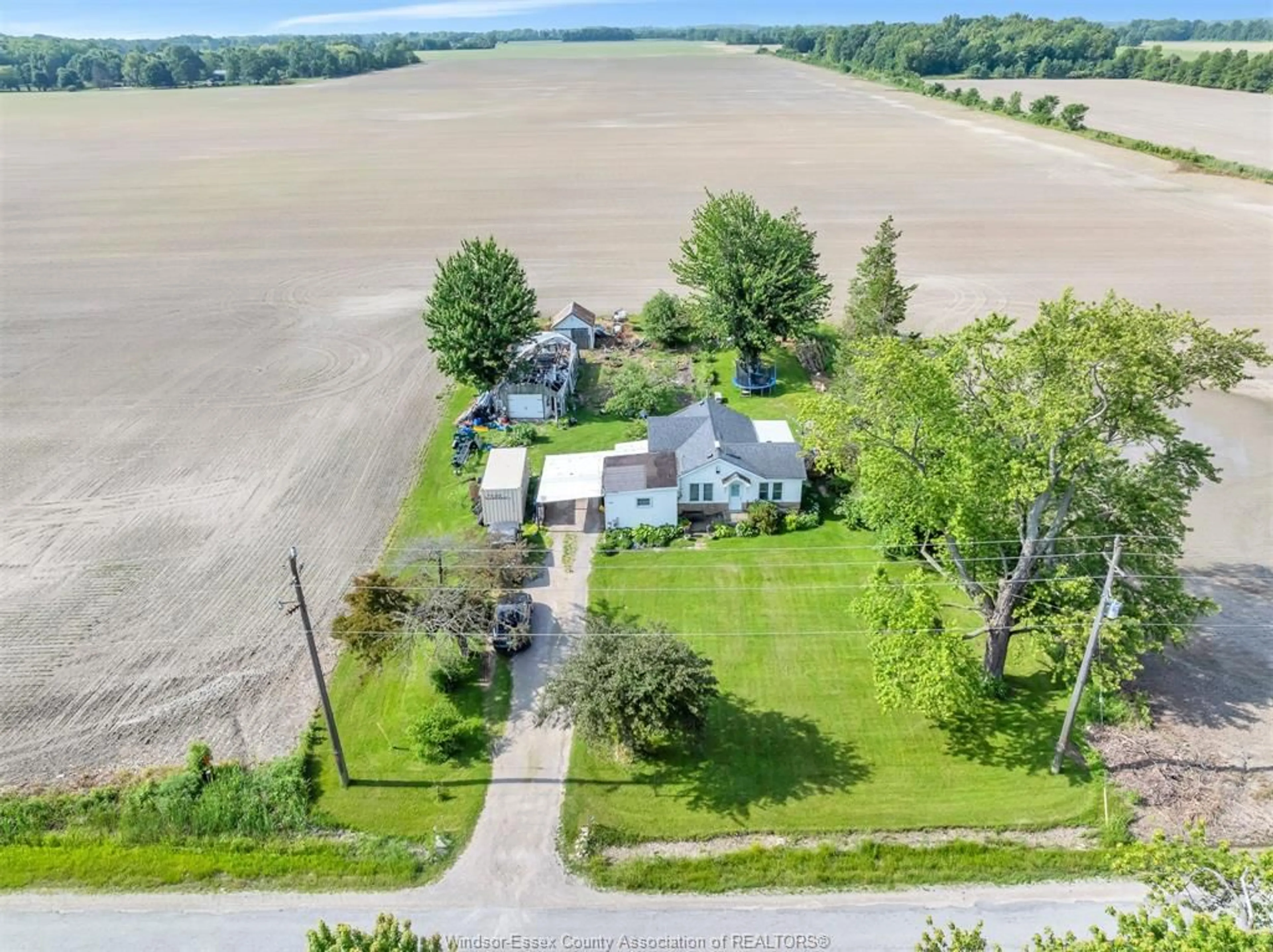 A pic from outside/outdoor area/front of a property/back of a property/a pic from drone, water/lake/river/ocean view for 1101 ROAD 2 WEST, Kingsville Ontario N9Y 2E4