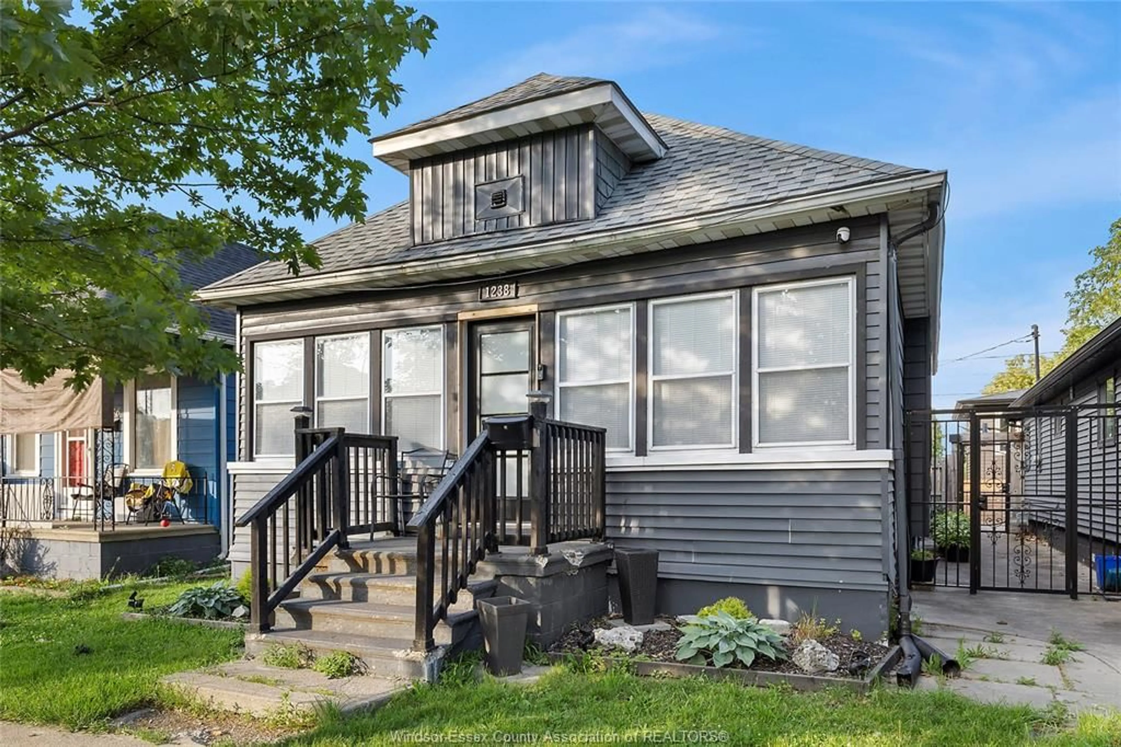Home with vinyl exterior material, street for 1238 ALBERT Rd, Windsor Ontario N8Y 3P7
