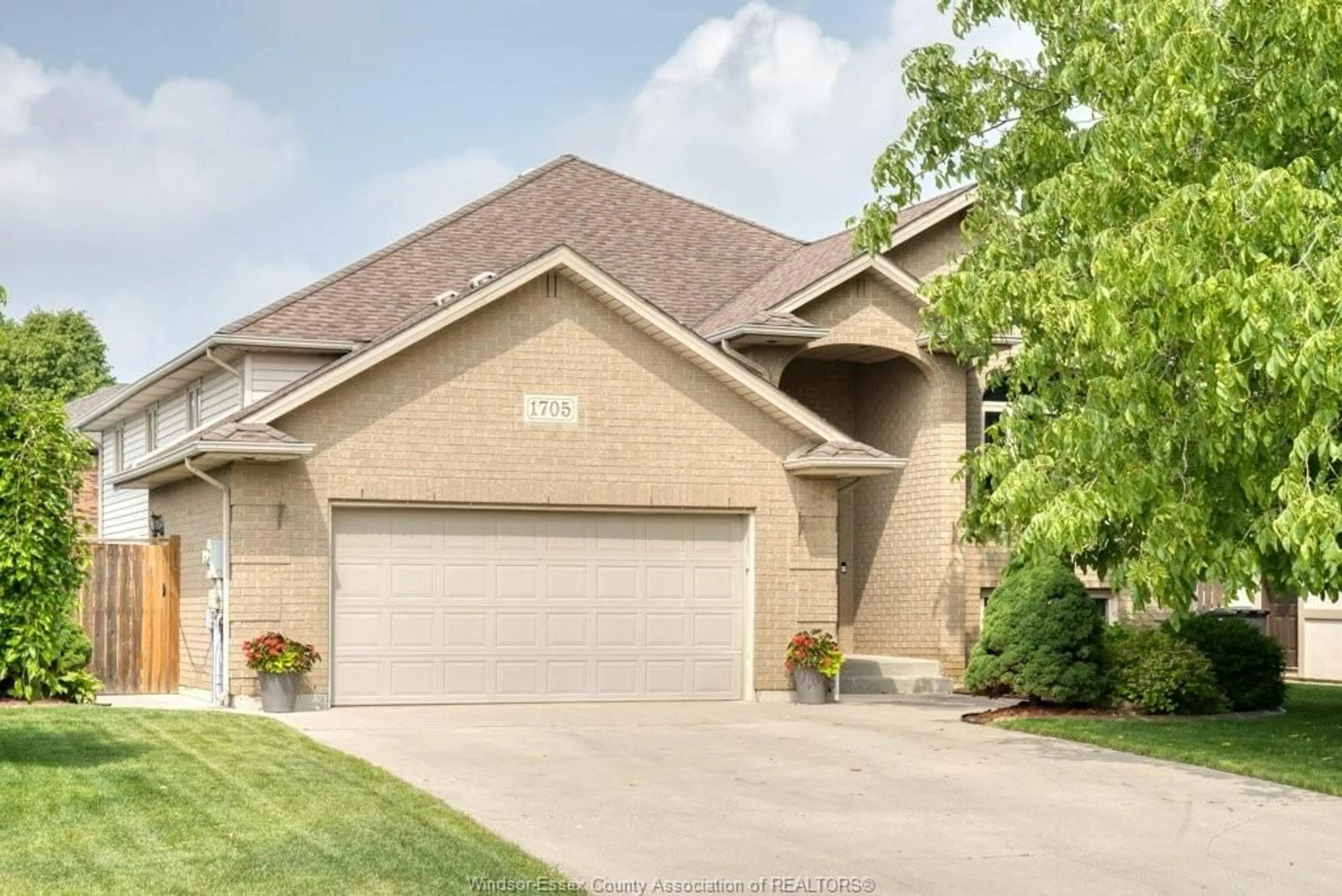 Home with brick exterior material, street for 1705 CHORNOBY Cres, Tecumseh Ontario N8N 5A1