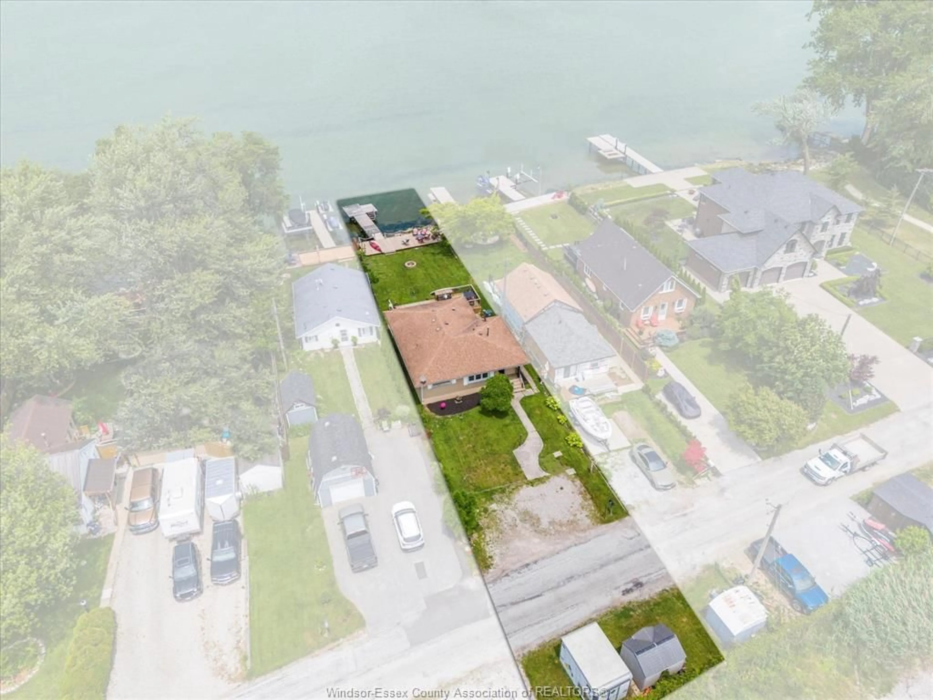 A pic from outside/outdoor area/front of a property/back of a property/a pic from drone, water/lake/river/ocean view for 591 ROSS BEACH Rd, Lakeshore Ontario N0R 1A0