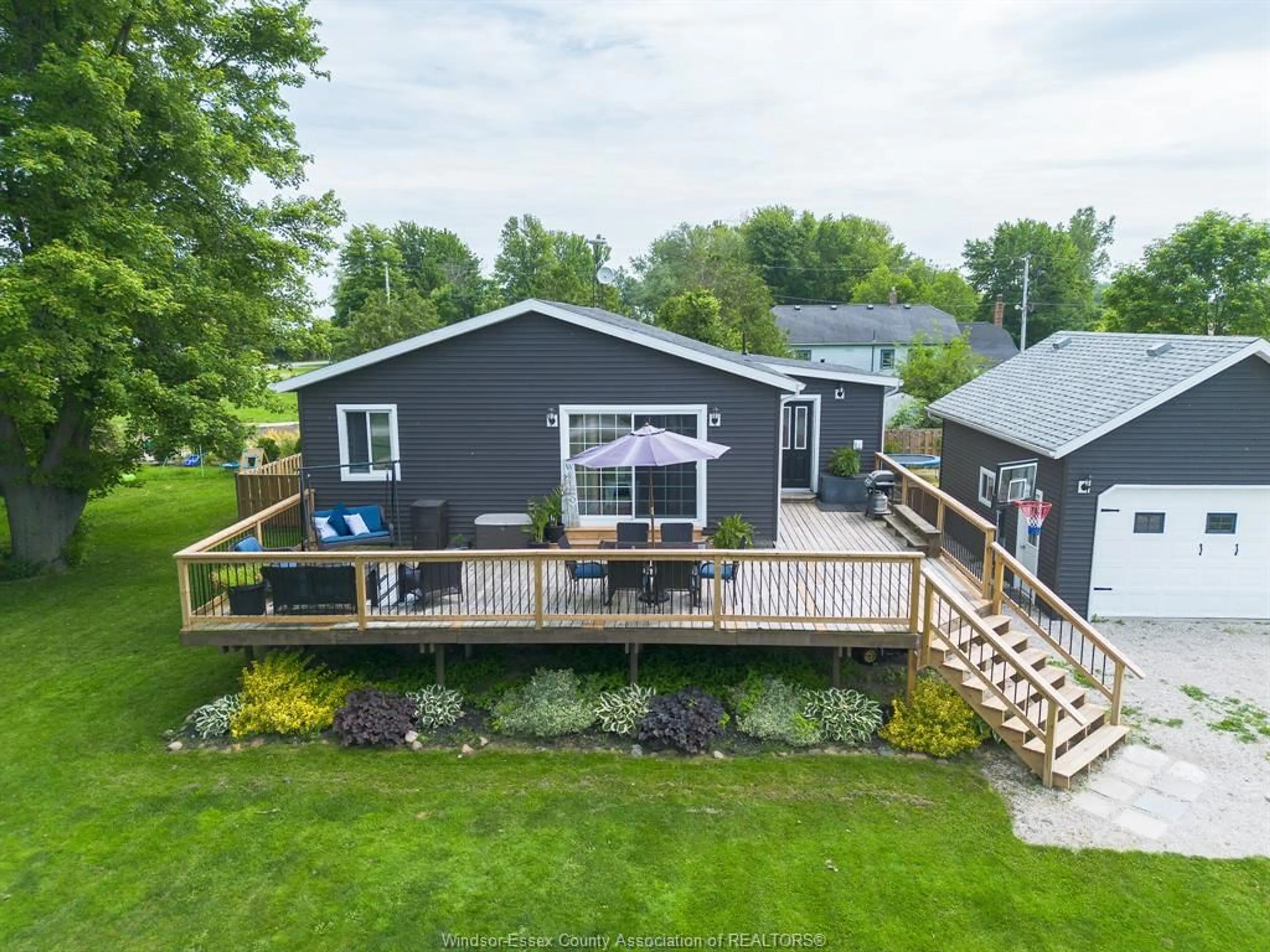 A pic from outside/outdoor area/front of a property/back of a property/a pic from drone, water/lake/river/ocean view for 14 Patricia, Wheatley Ontario N0P 2P0