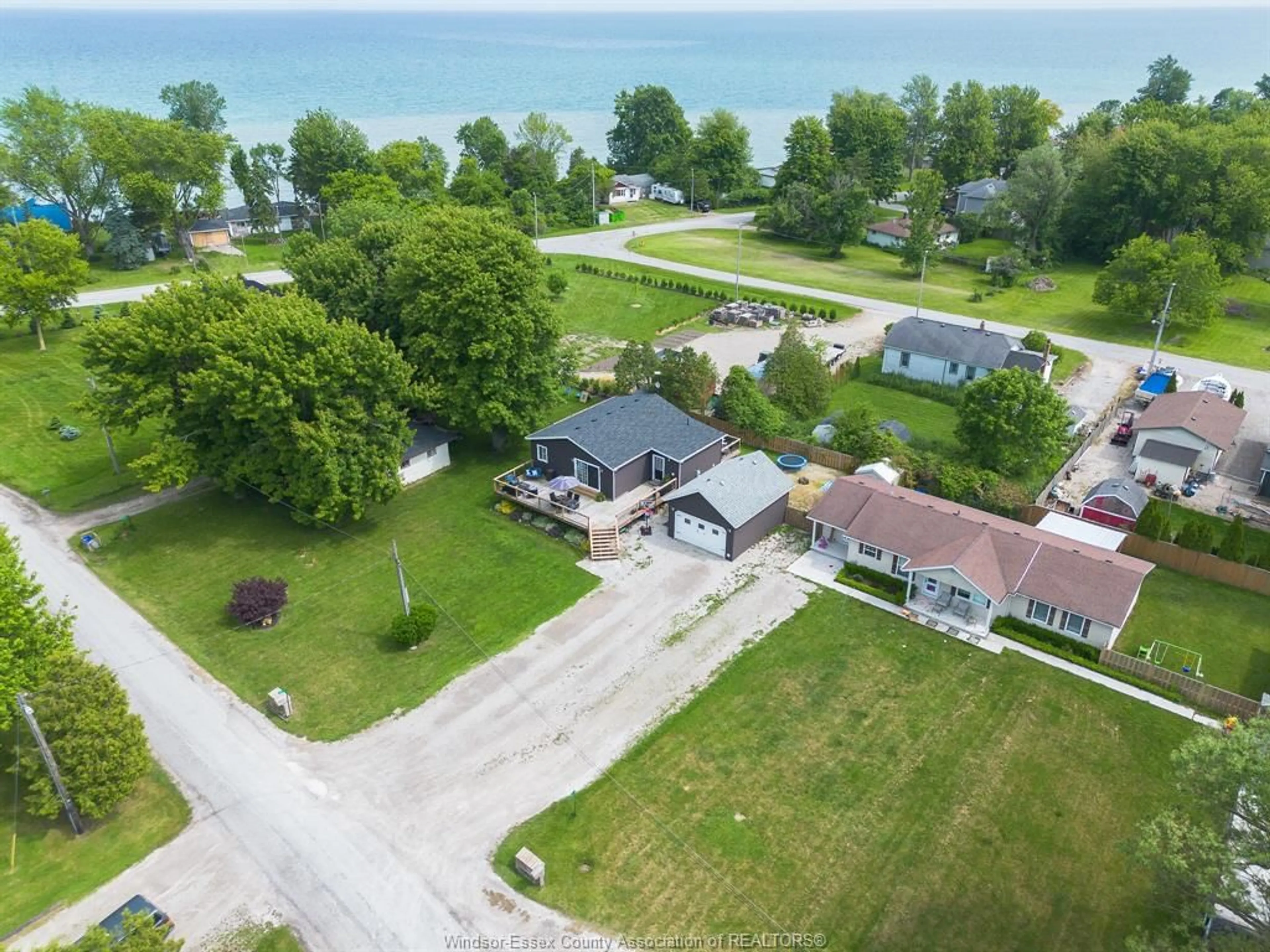 A pic from outside/outdoor area/front of a property/back of a property/a pic from drone, water/lake/river/ocean view for 14 Patricia, Wheatley Ontario N0P 2P0