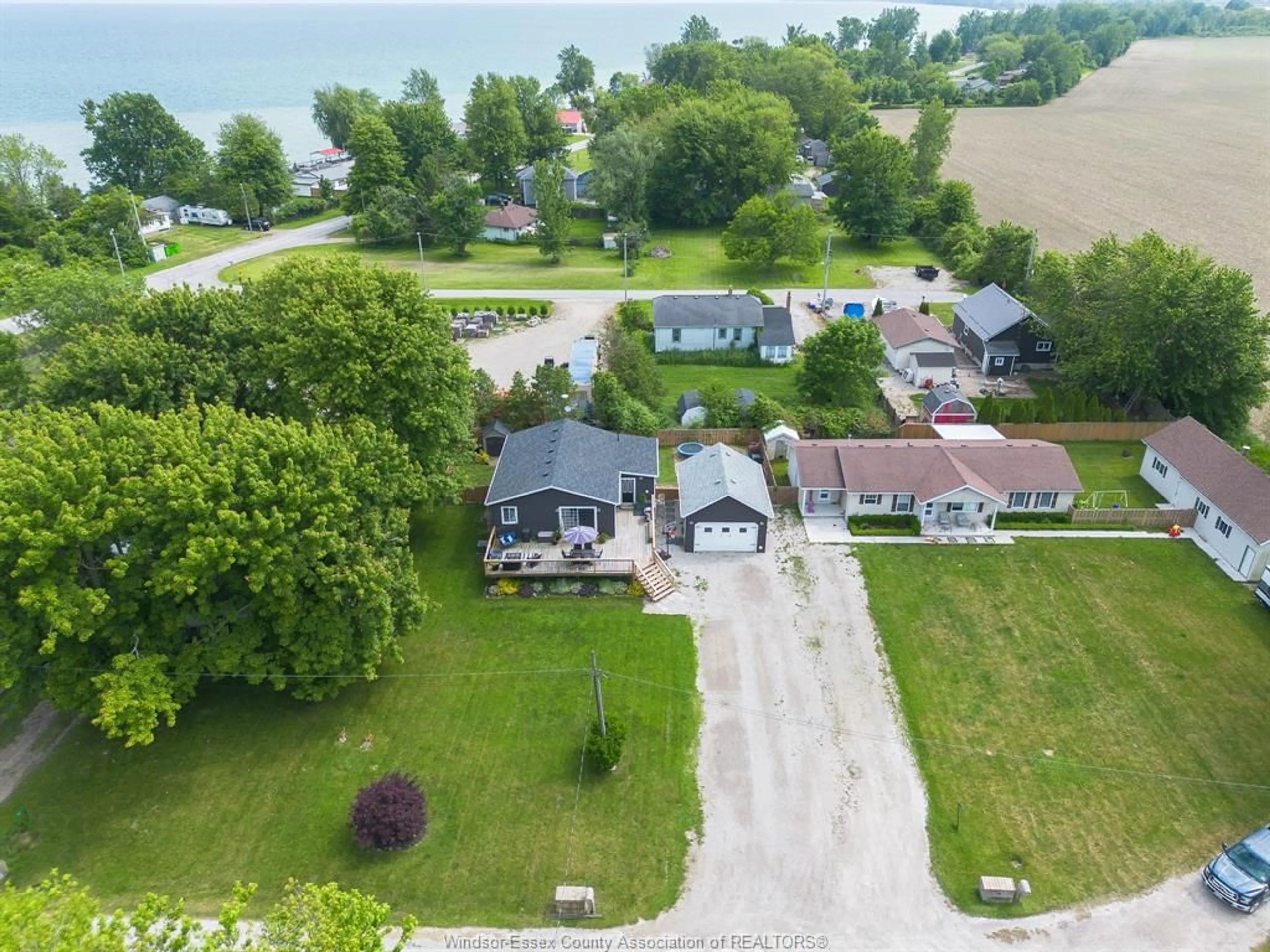 A pic from outside/outdoor area/front of a property/back of a property/a pic from drone, water/lake/river/ocean view for 14 Patricia, Wheatley Ontario N0P 2P0