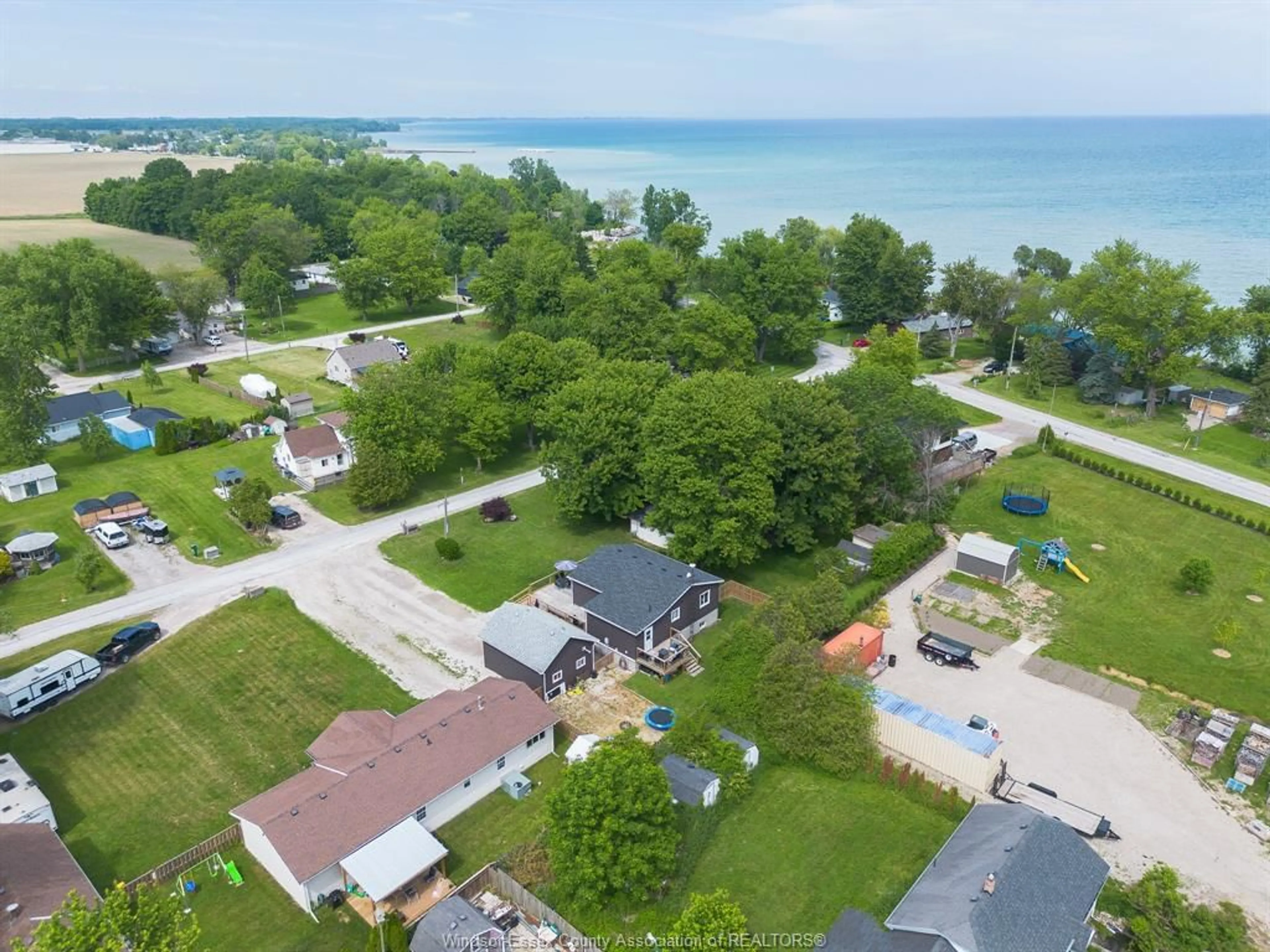 A pic from outside/outdoor area/front of a property/back of a property/a pic from drone, water/lake/river/ocean view for 14 Patricia, Wheatley Ontario N0P 2P0