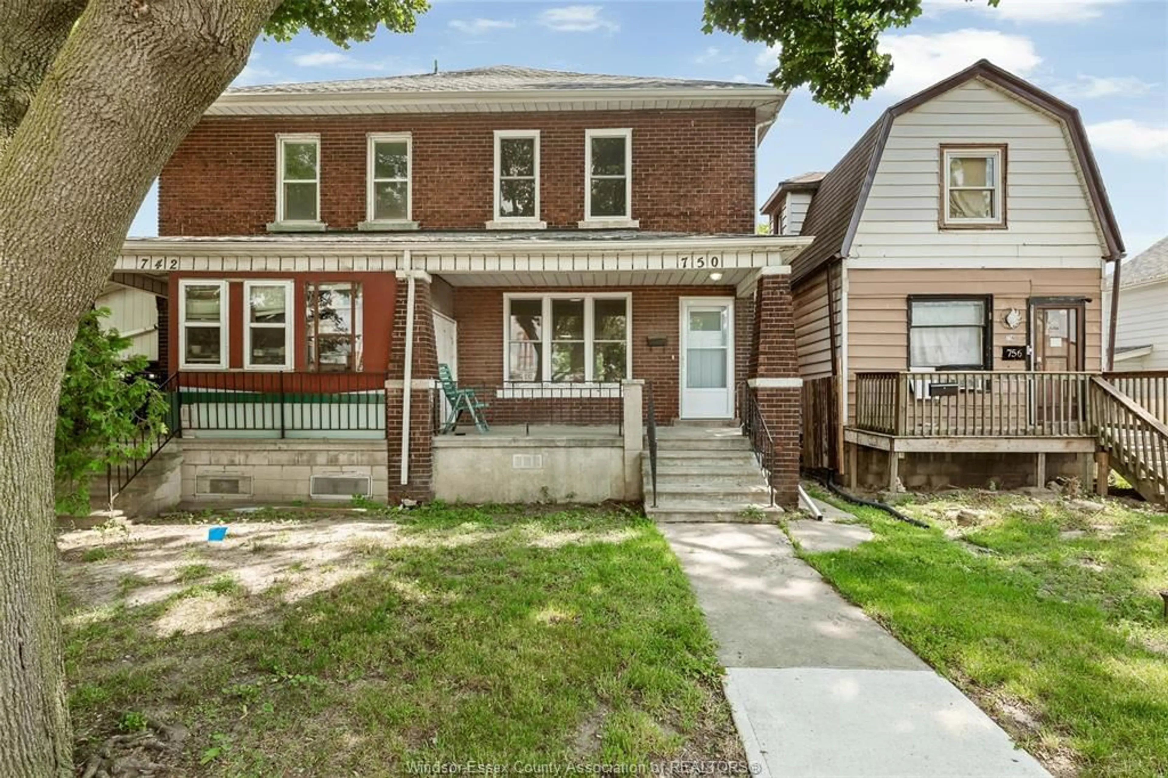 Home with brick exterior material, street for 750 CARON Ave, Windsor Ontario N9A 5B6