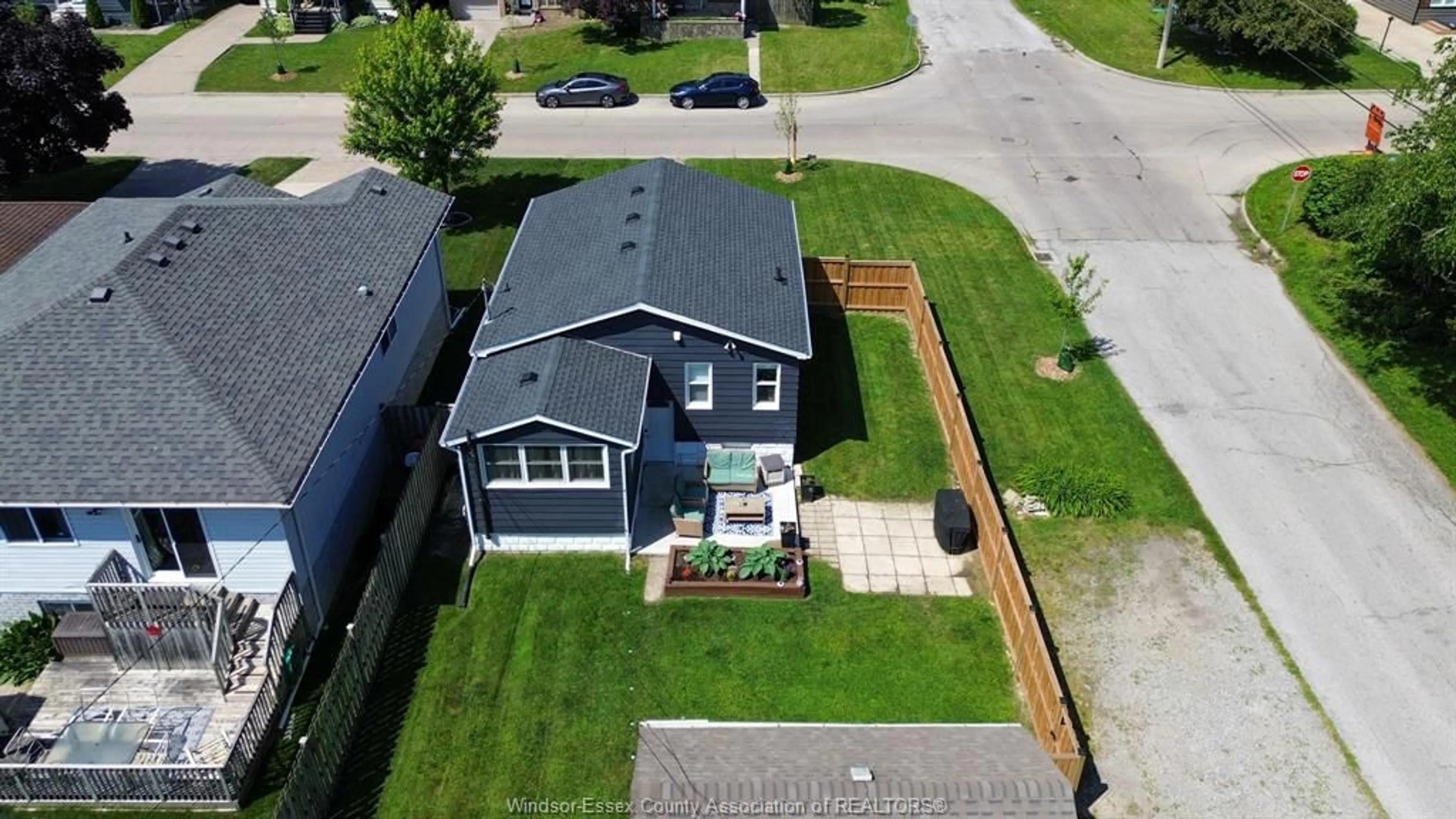 A pic from outside/outdoor area/front of a property/back of a property/a pic from drone, street for 2402 TOURANGEAU, Windsor Ontario N8W 4N7