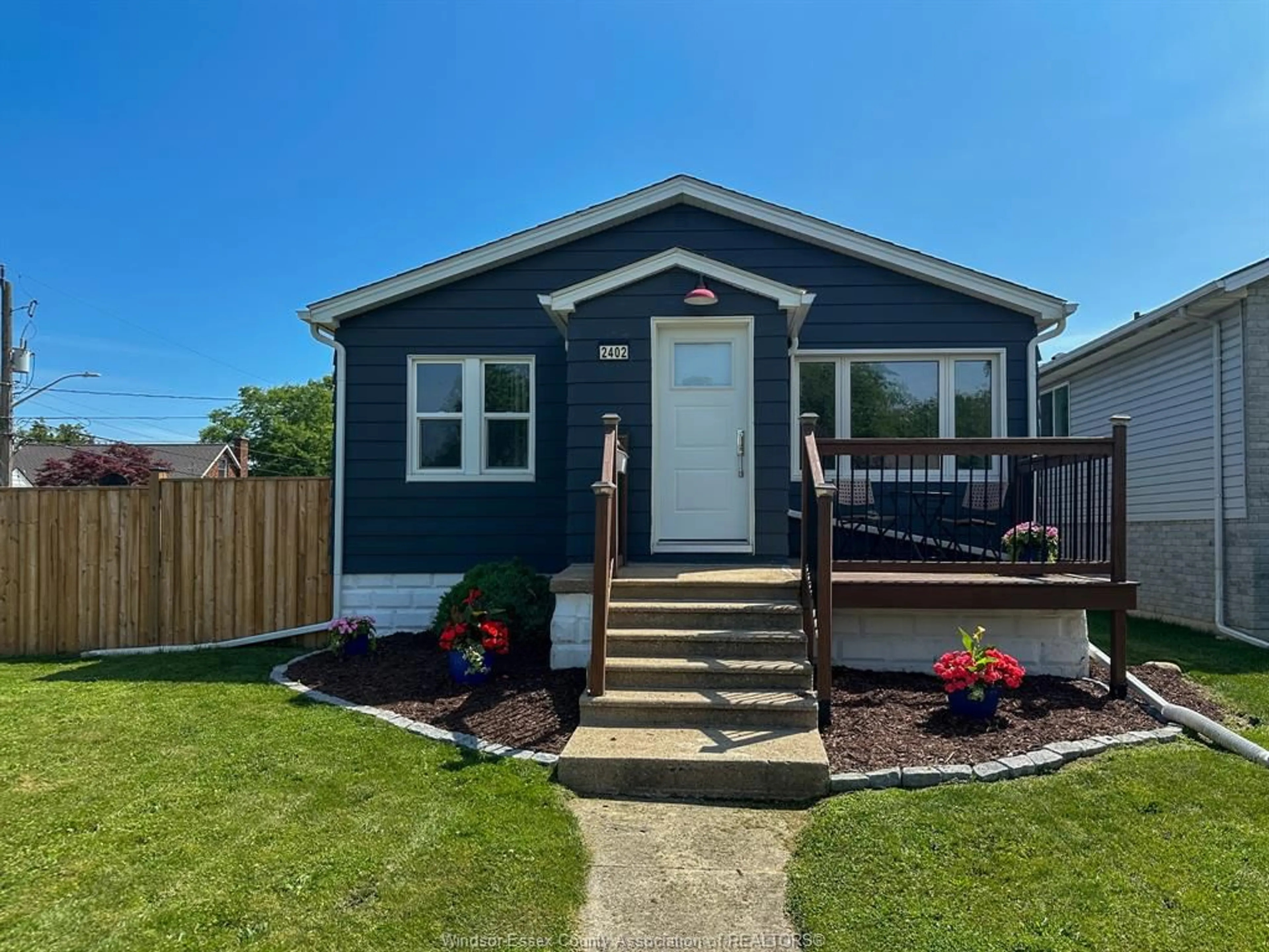 Home with vinyl exterior material, street for 2402 TOURANGEAU, Windsor Ontario N8W 4N7