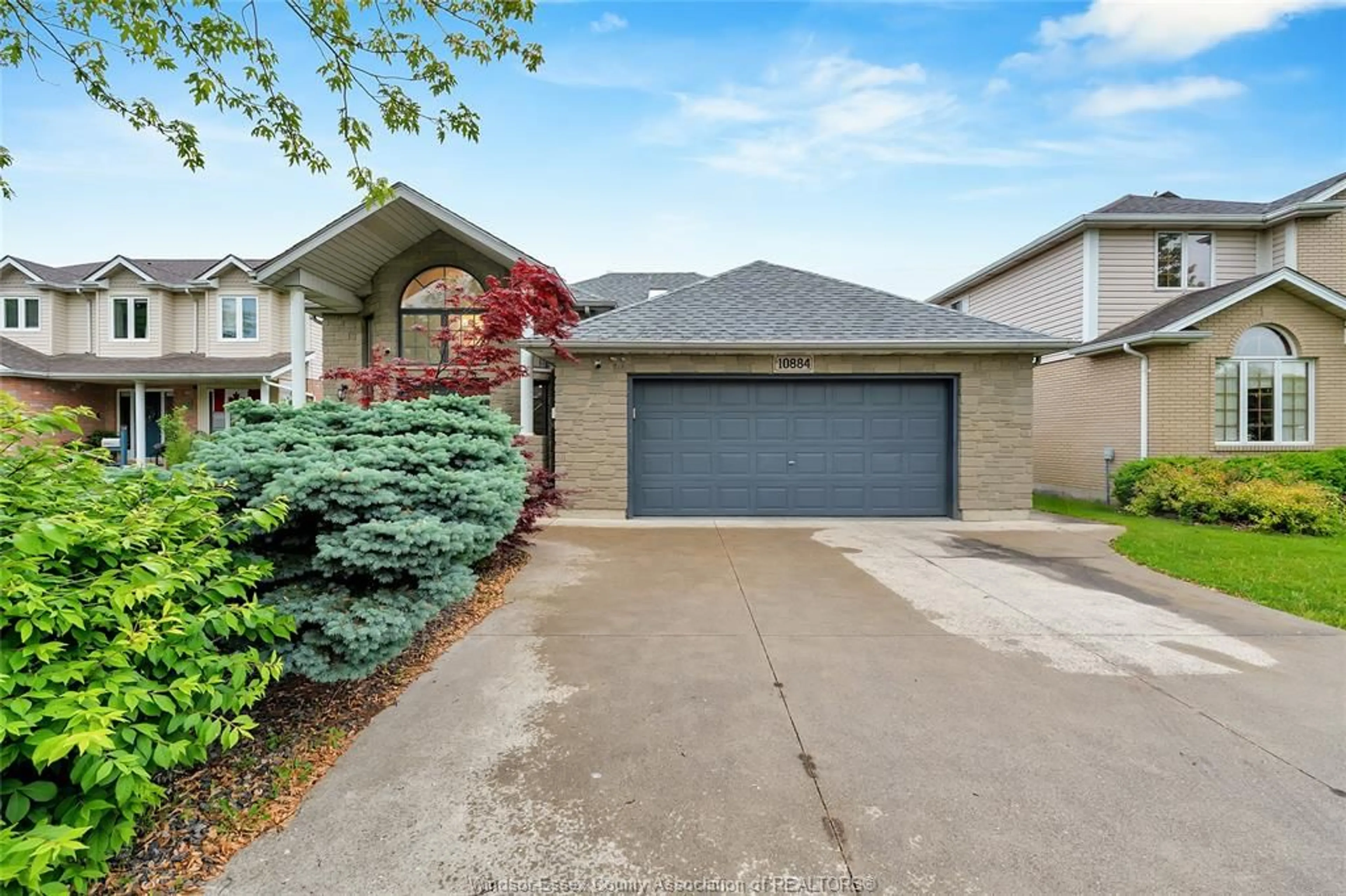 Home with brick exterior material, street for 10884 BRENTWOOD Cres, Windsor Ontario N8R 2H8