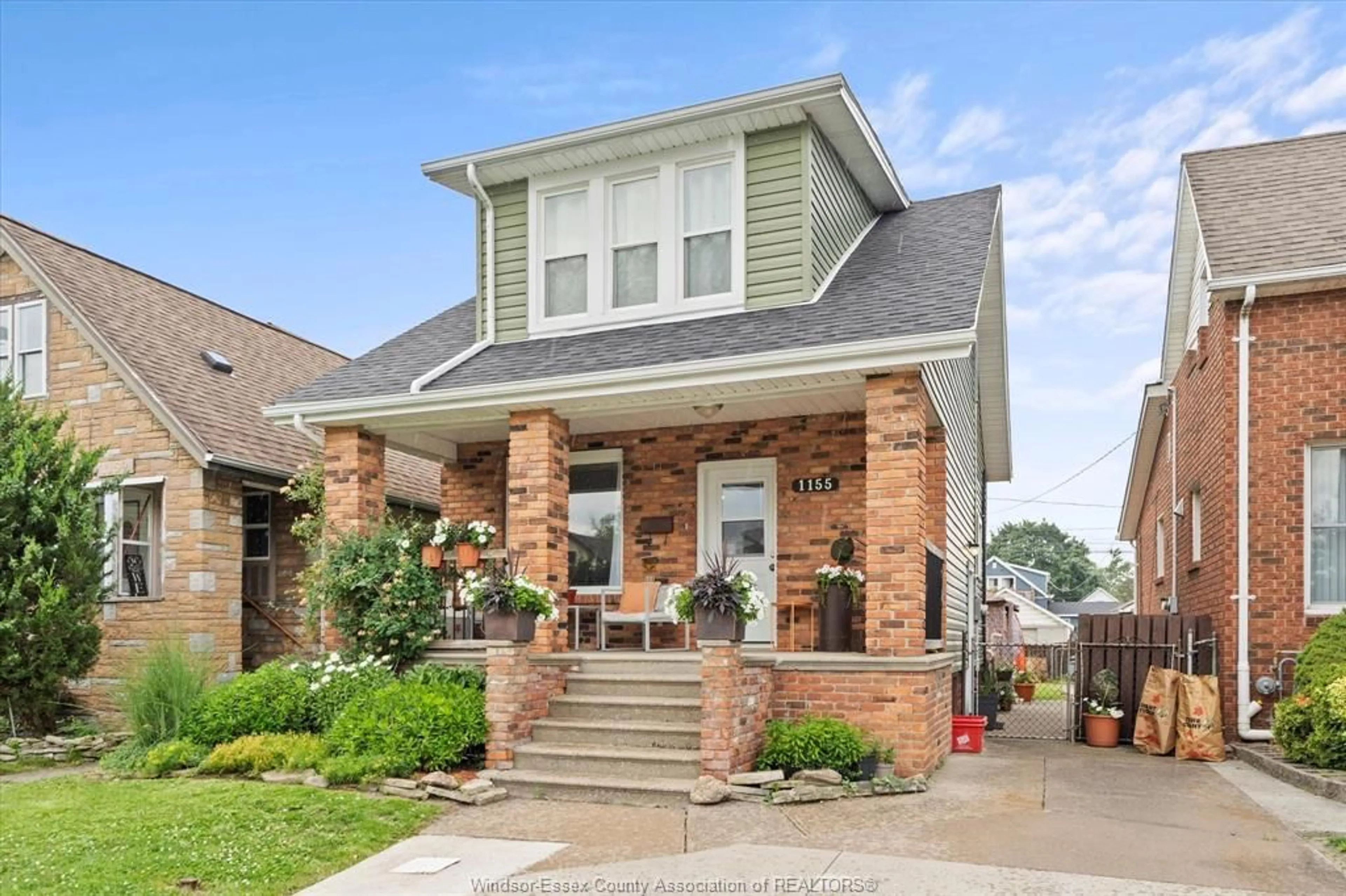Home with brick exterior material, street for 1155 HALL, Windsor Ontario N9A 2M8