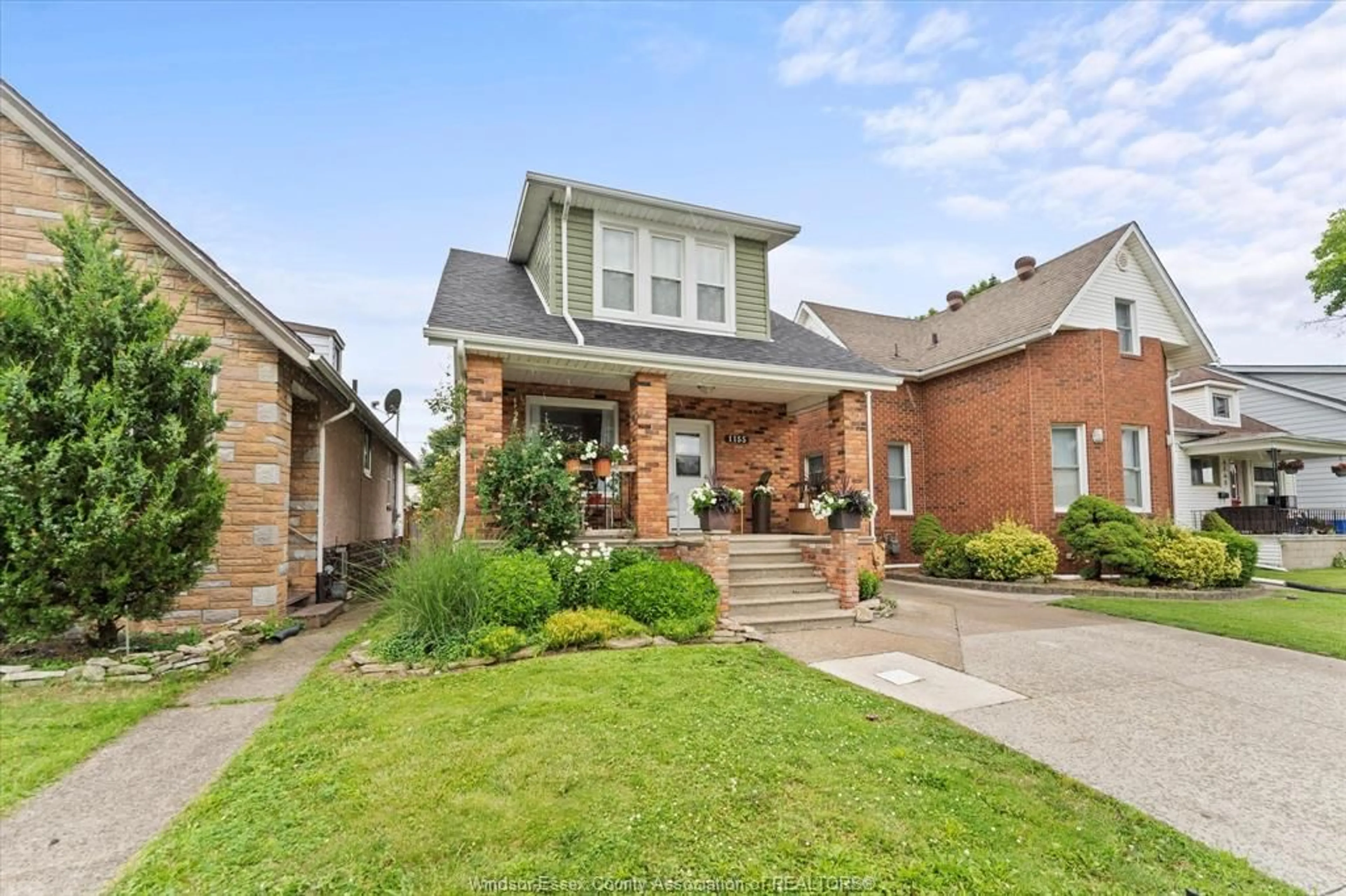 Home with brick exterior material, street for 1155 HALL, Windsor Ontario N9A 2M8