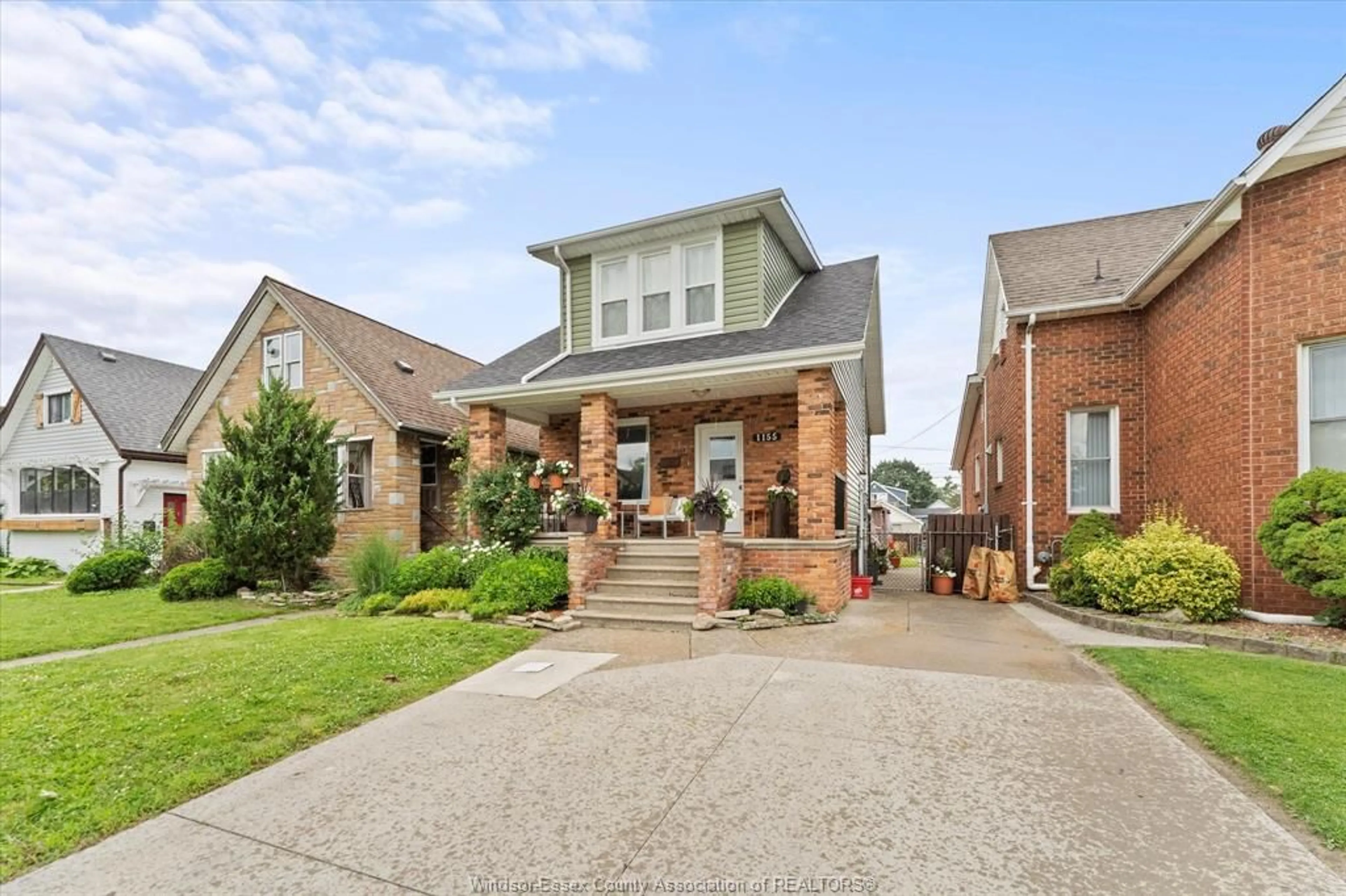 Home with brick exterior material, street for 1155 HALL, Windsor Ontario N9A 2M8
