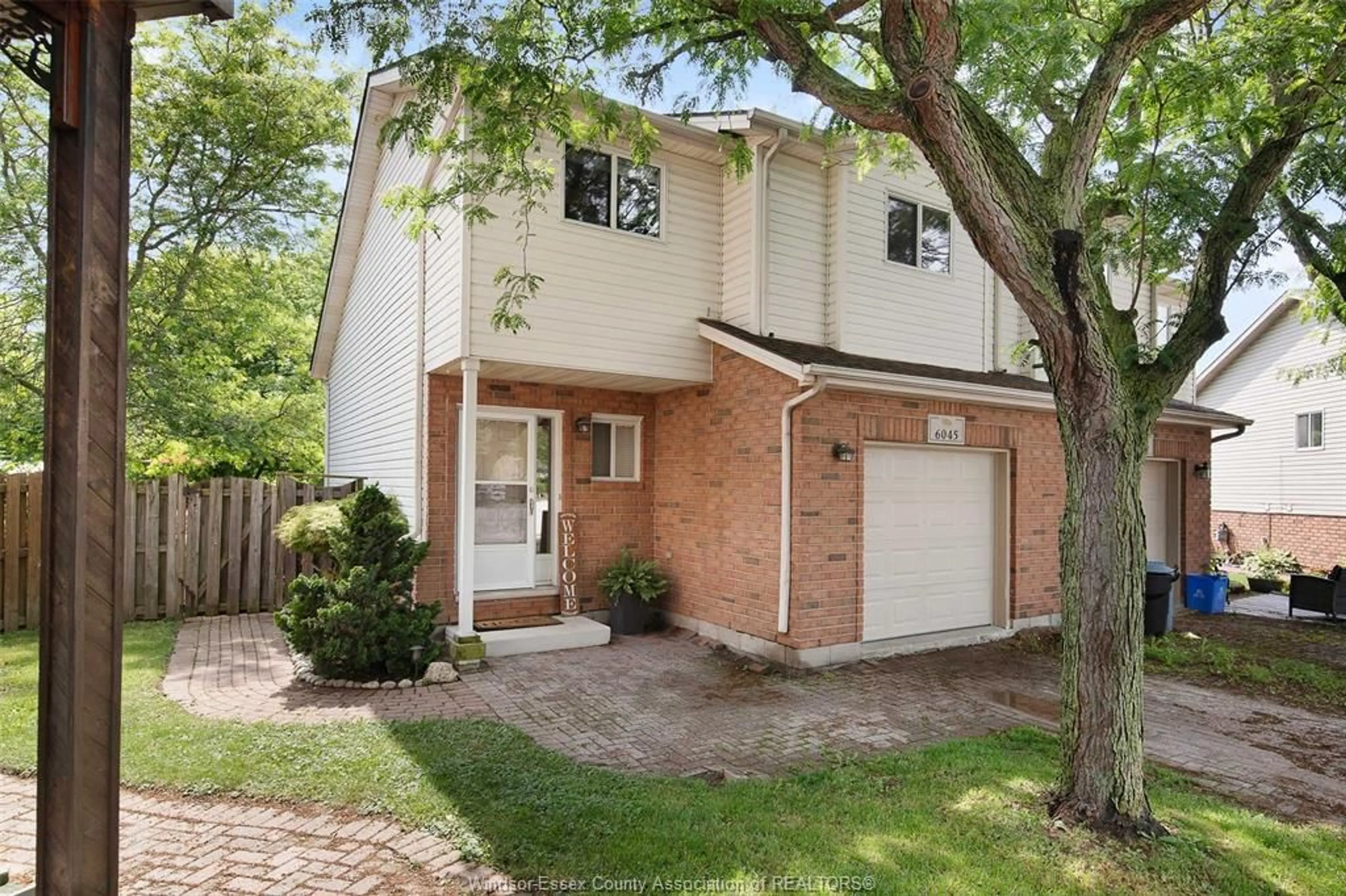 Home with brick exterior material, street for 6045 North Woodmont, LaSalle Ontario N9J 3P3