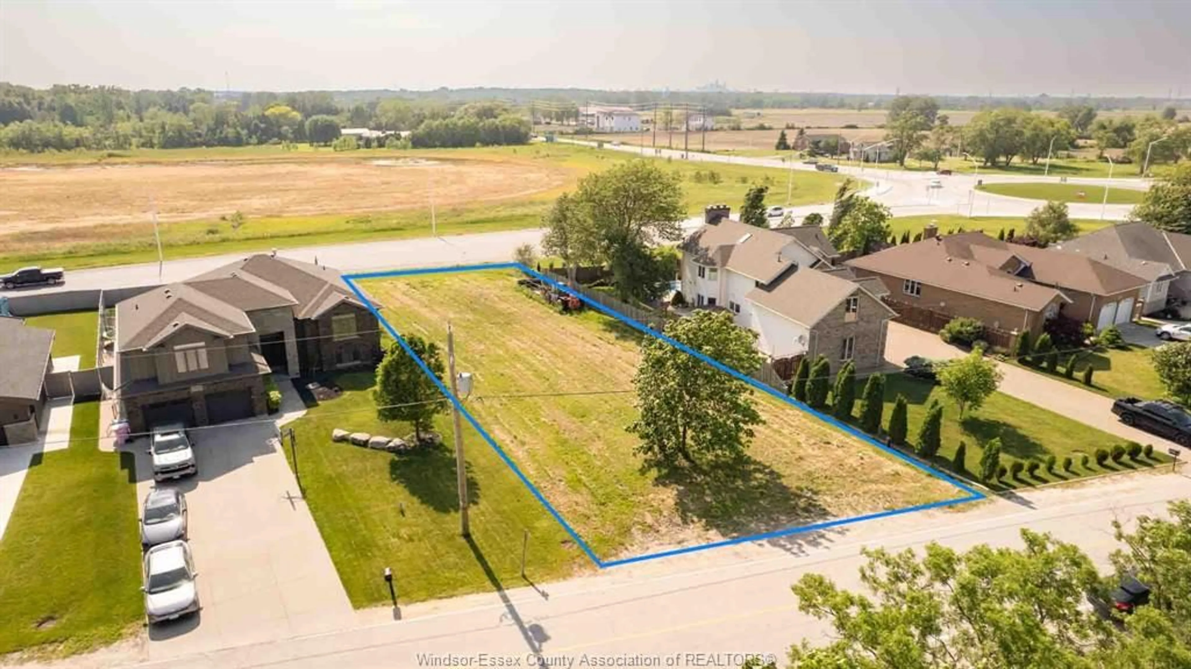 A pic from outside/outdoor area/front of a property/back of a property/a pic from drone, water/lake/river/ocean view for 3423 11TH CONCESSION, Tecumseh Ontario N0R 1K0
