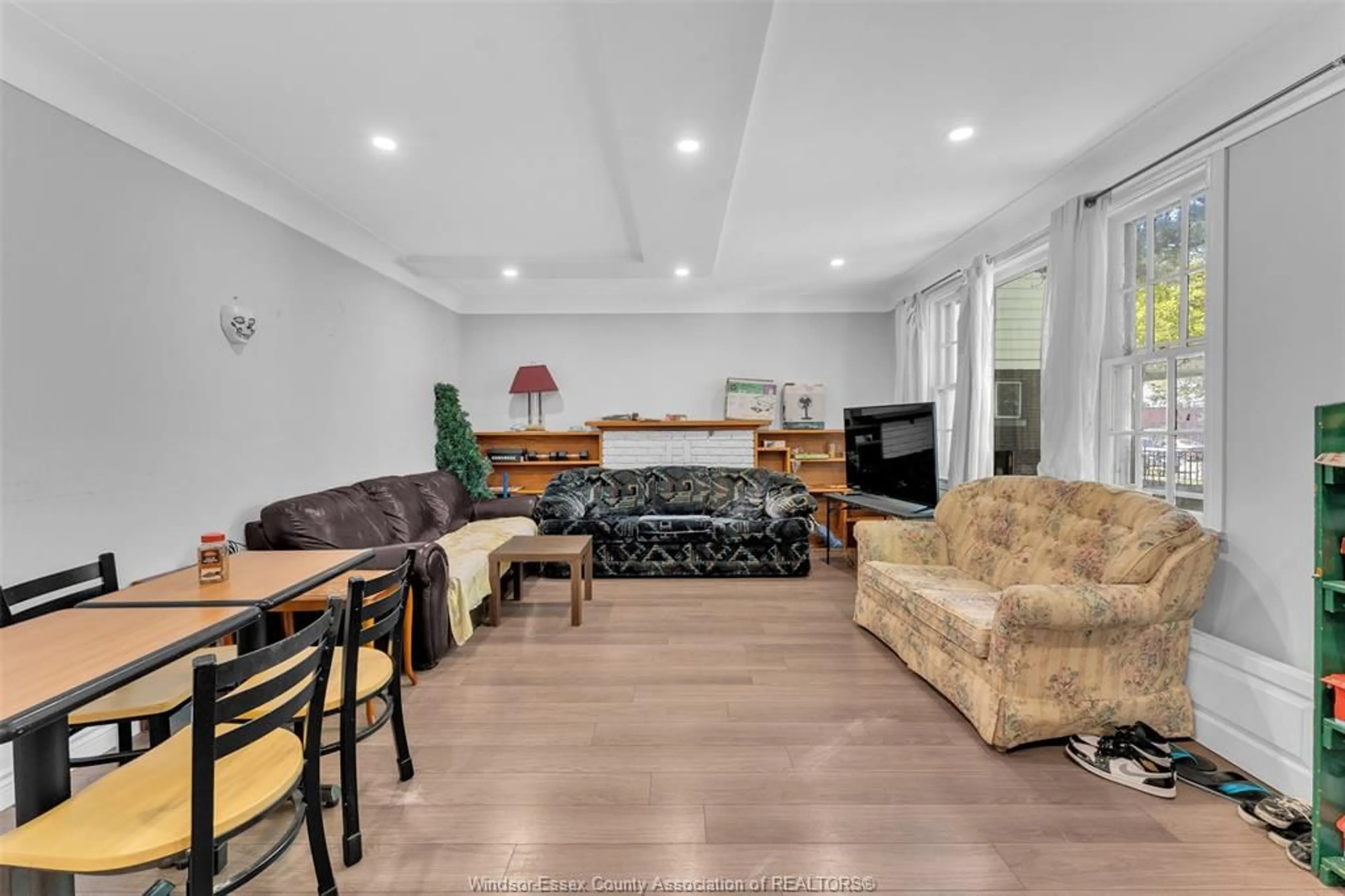 Living room with furniture, wood/laminate floor for 559 VANIER, Windsor Ontario N8X 3E2