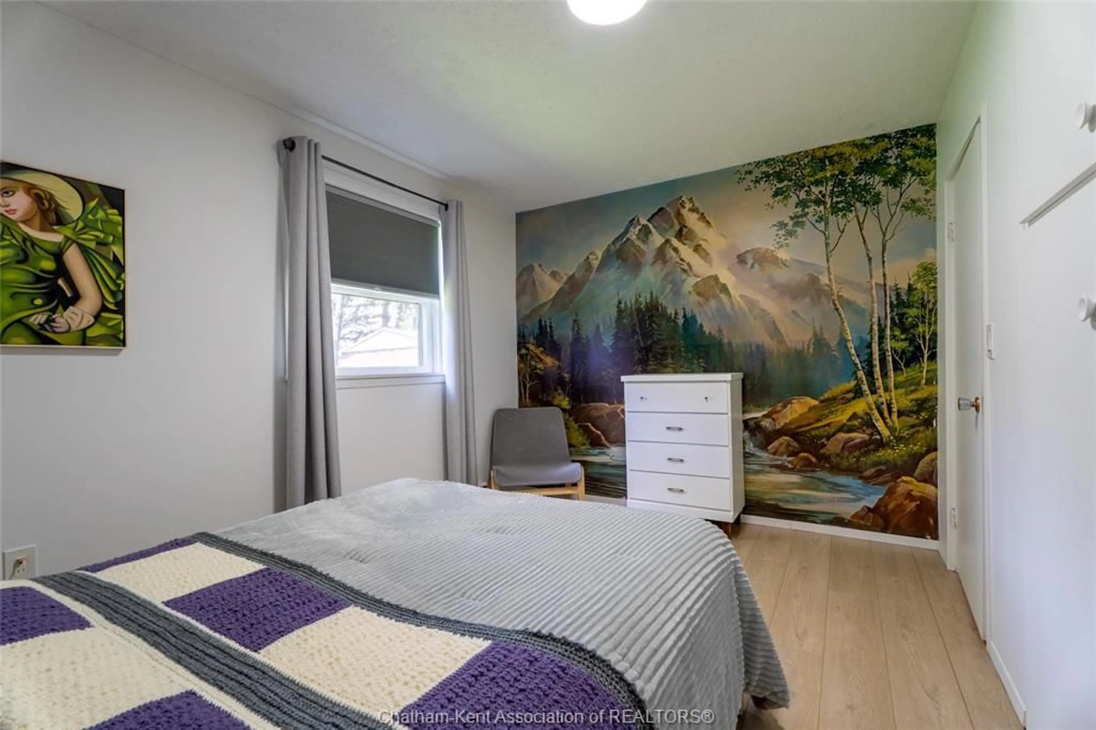 Bedroom with bed, wood/laminate floor for 6959 RIVERVIEW Line, Chatham Ontario N7M 5T1