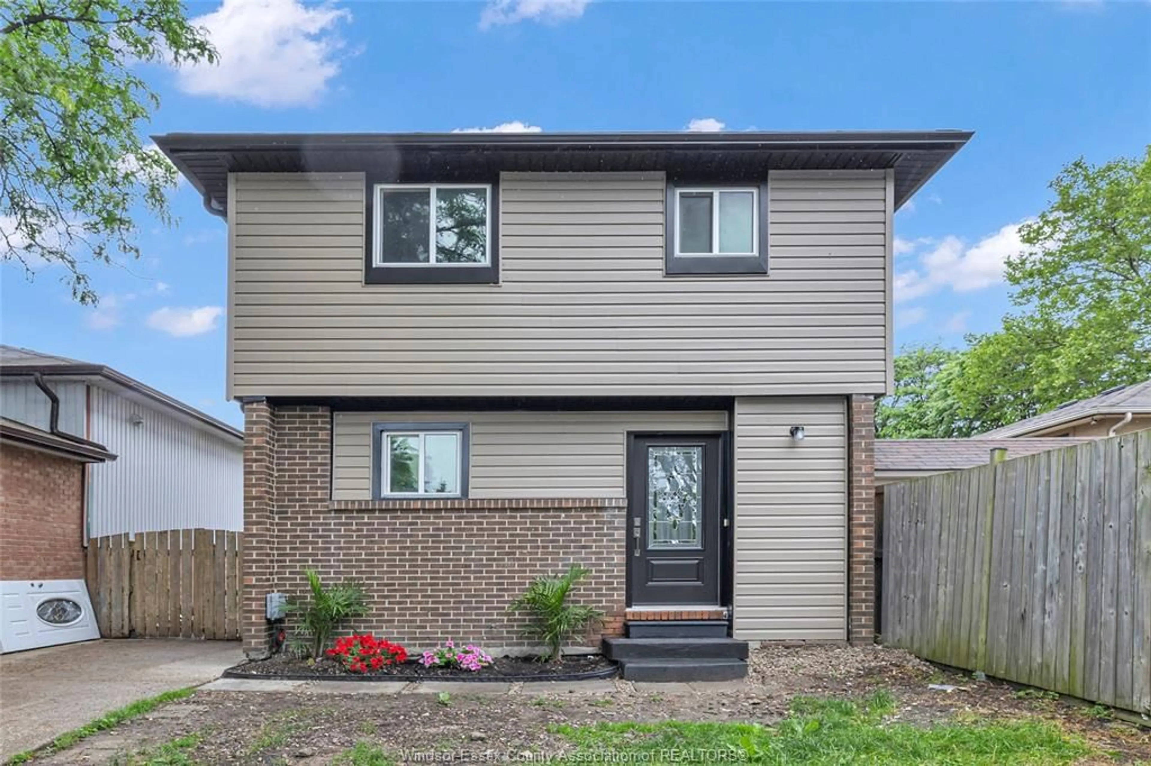 Home with brick exterior material, street for 1205 ENFIELD Crt, Windsor Ontario N9S 4N1