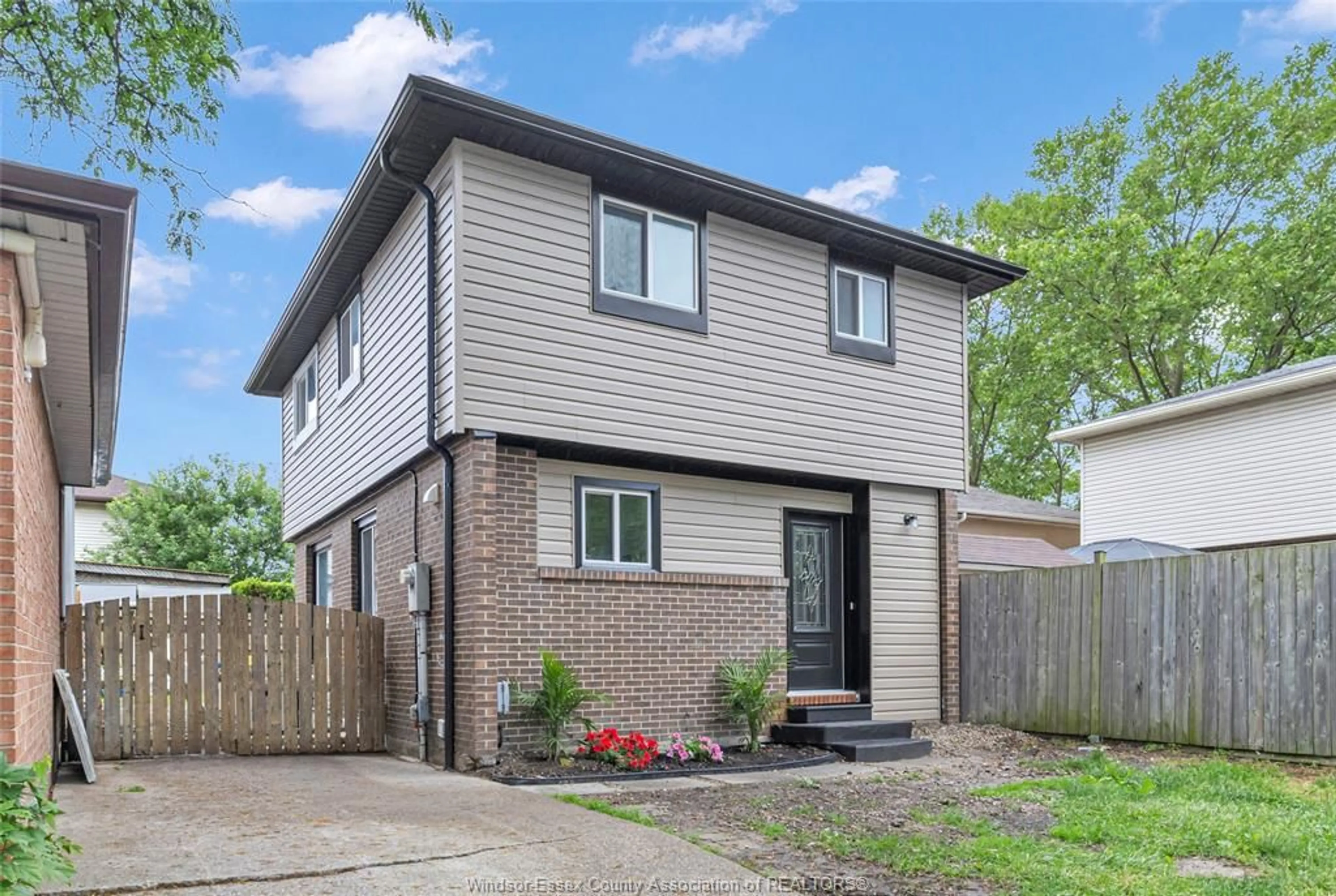 Home with brick exterior material, street for 1205 ENFIELD Crt, Windsor Ontario N9S 4N1