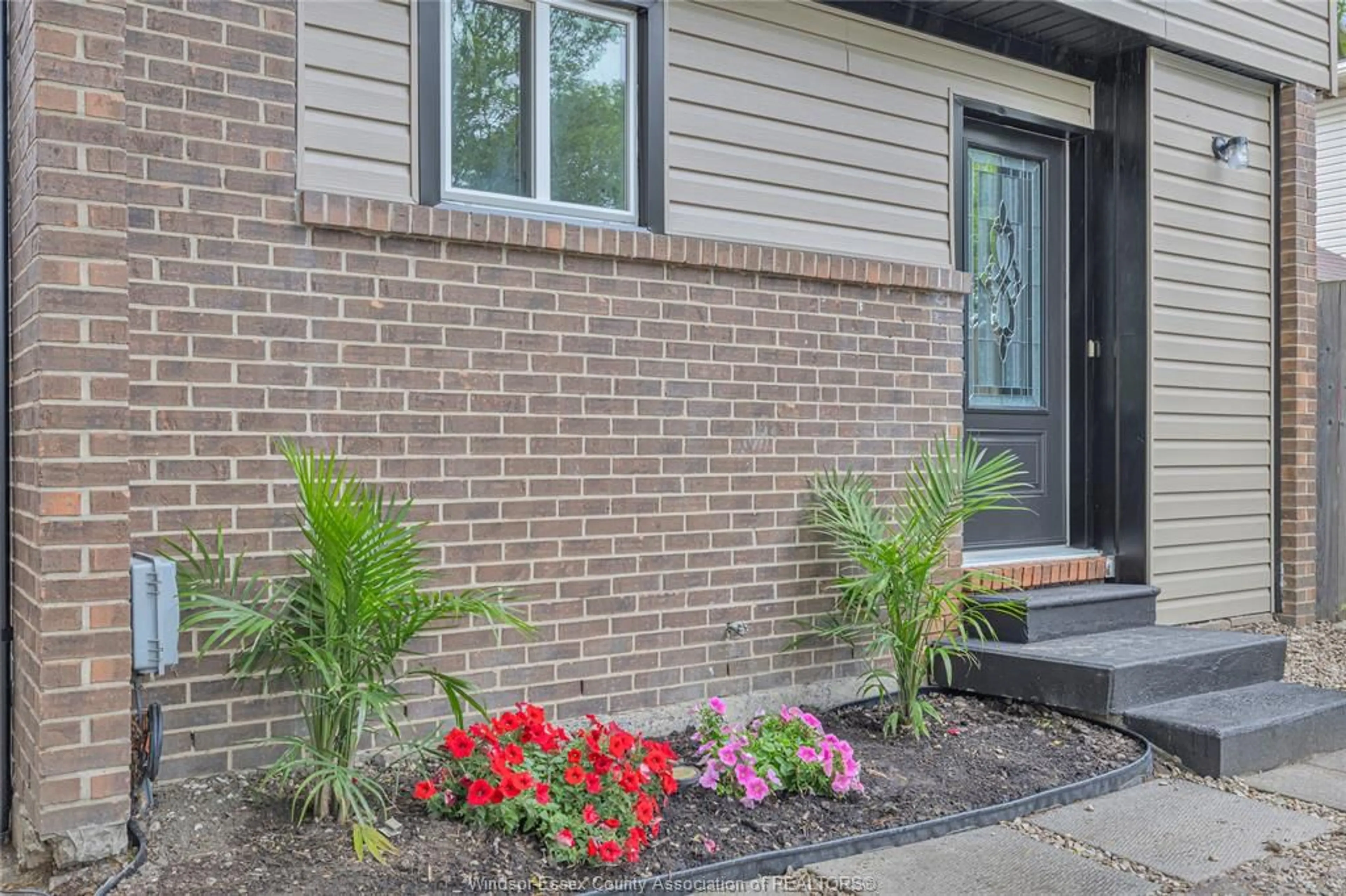Home with brick exterior material, street for 1205 ENFIELD Crt, Windsor Ontario N9S 4N1