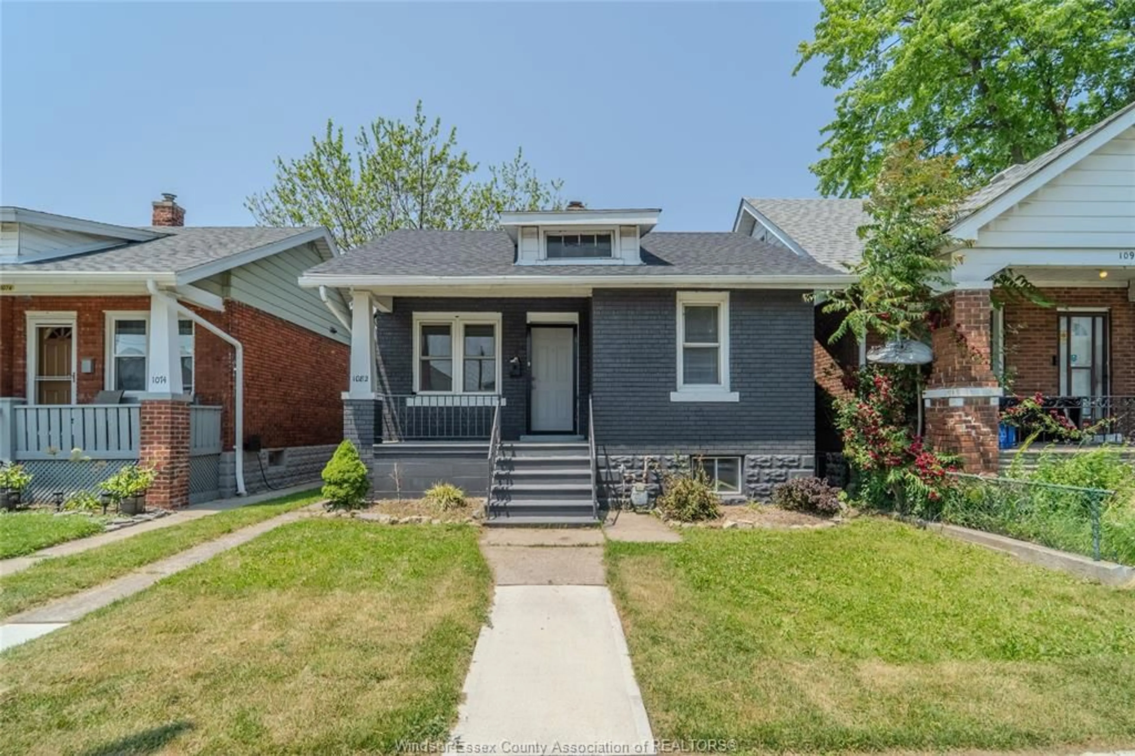 Home with brick exterior material, street for 1082 ELLIS St, Windsor Ontario N8X 2J9