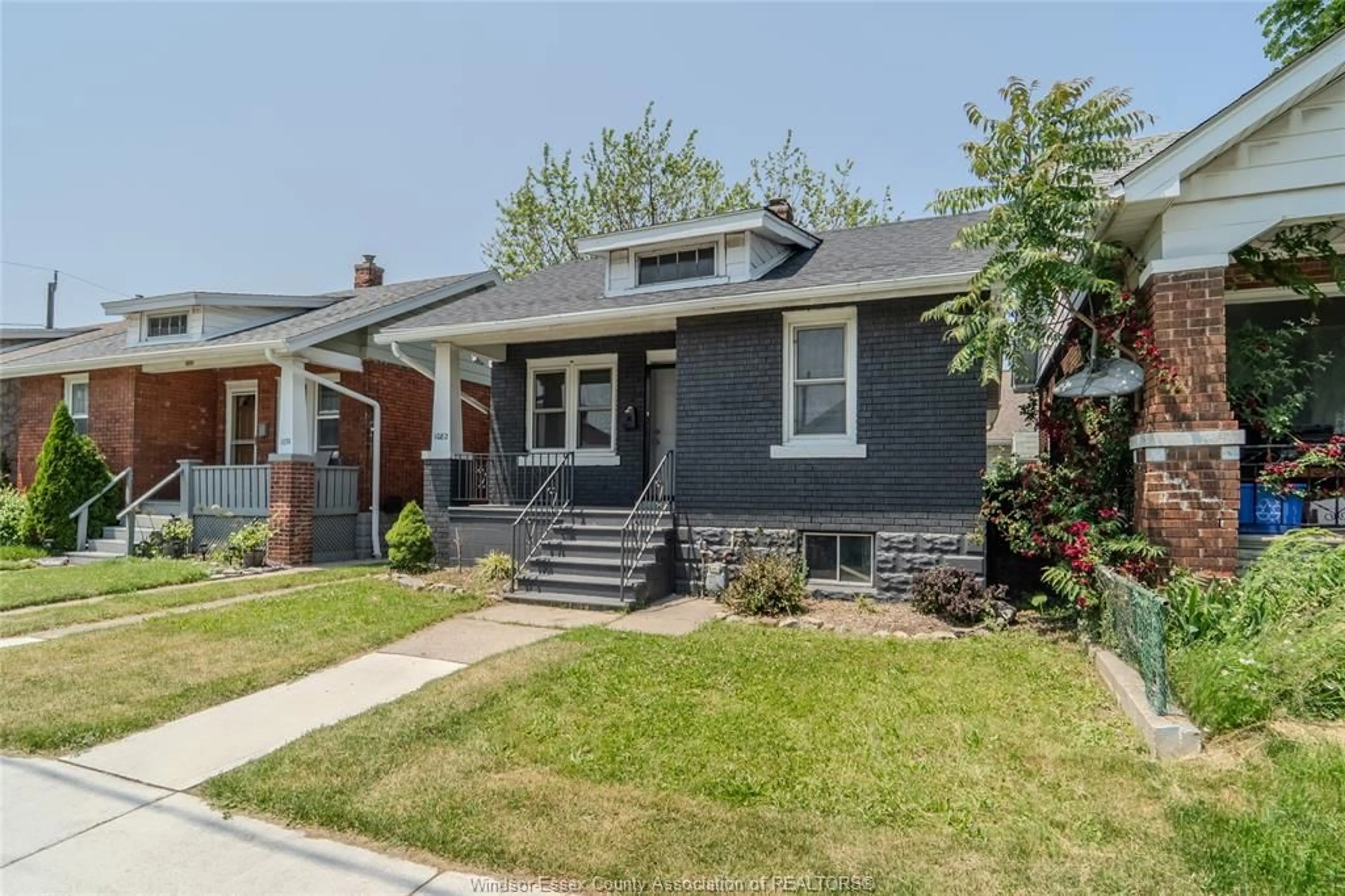 Home with brick exterior material, street for 1082 ELLIS St, Windsor Ontario N8X 2J9