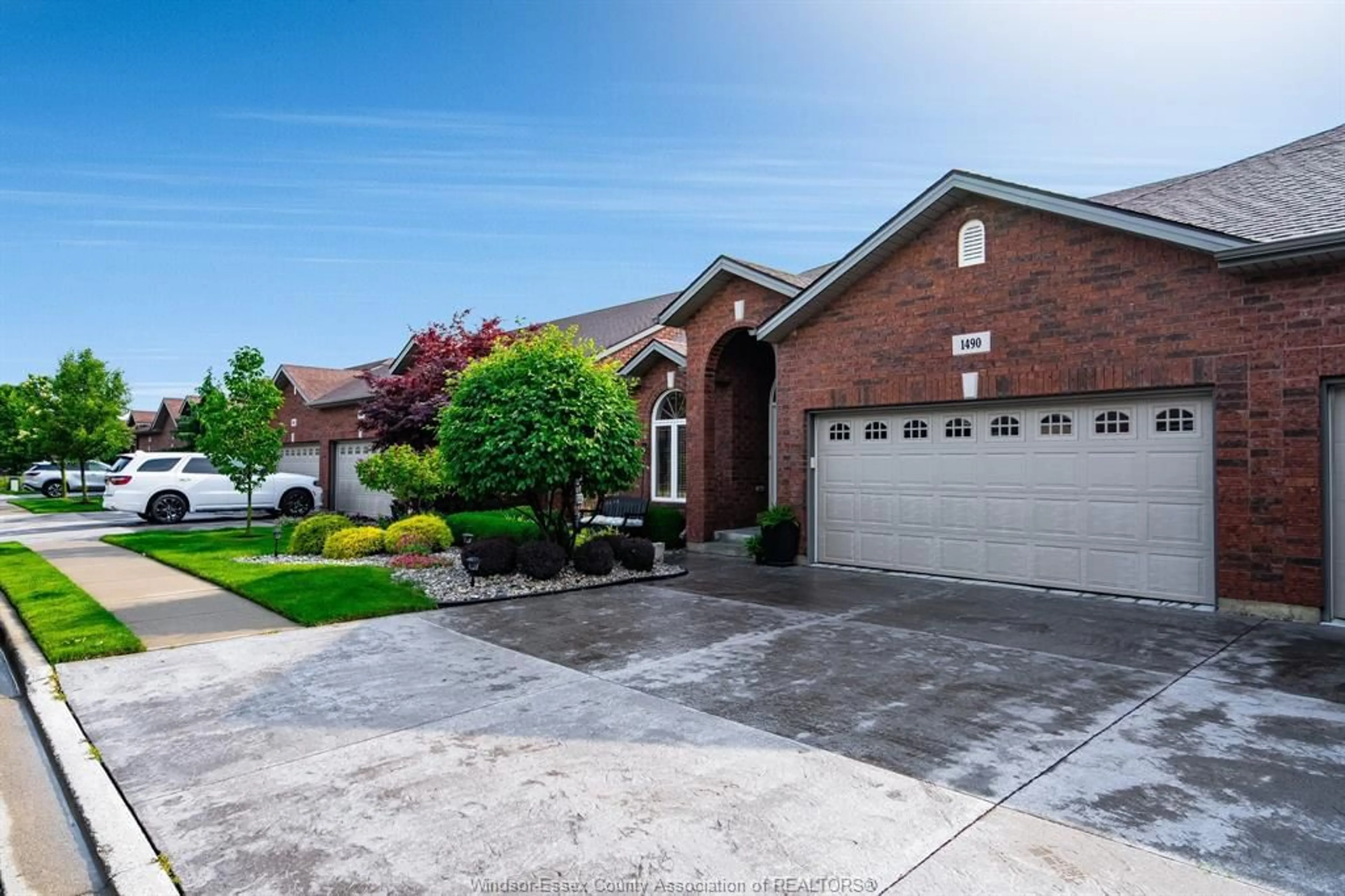 Home with brick exterior material, street for 1490 Aspenshore, Windsor Ontario N8P 1Y5