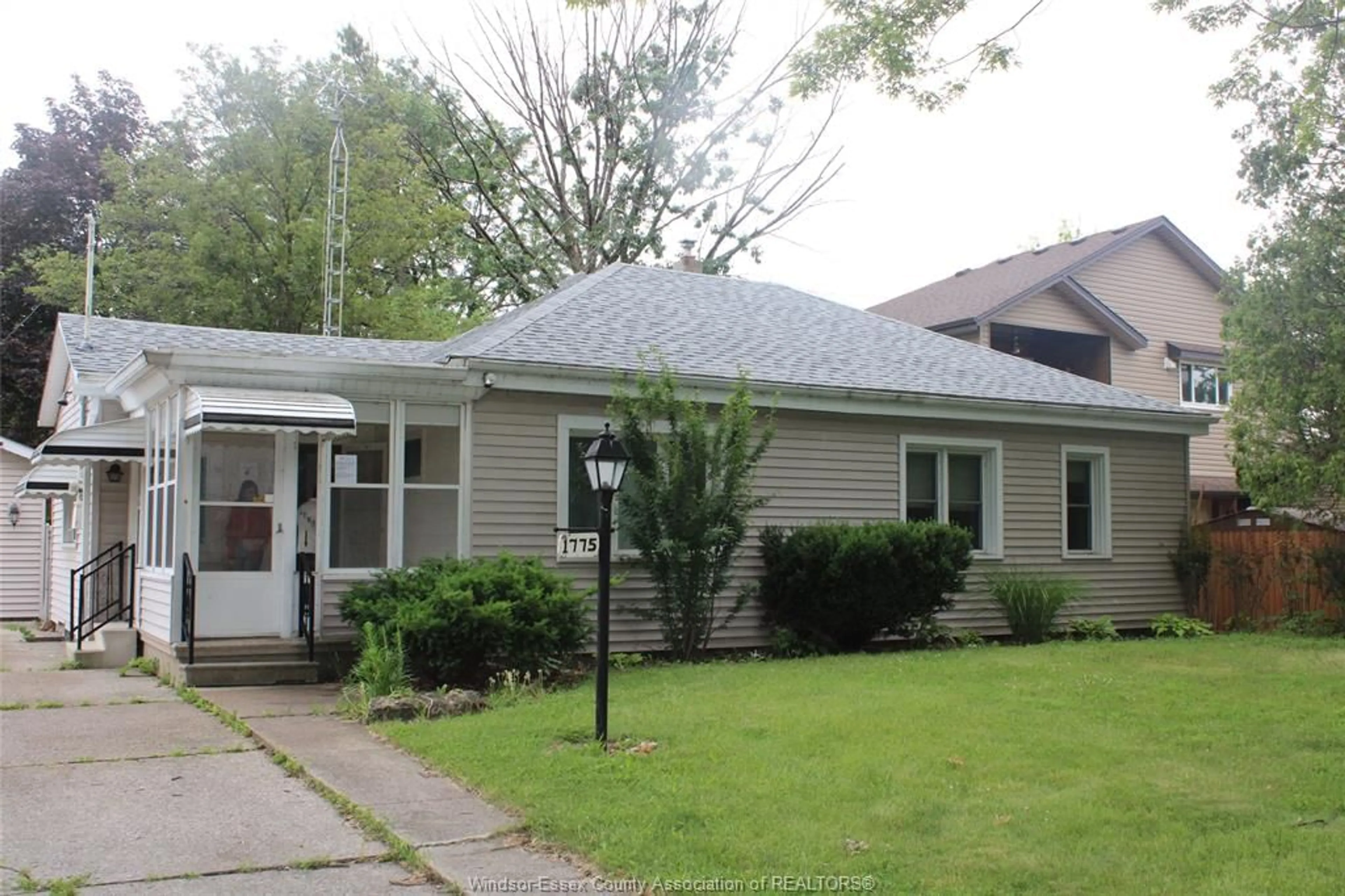 Home with vinyl exterior material, street for 1775 WESTMINSTER Blvd, Windsor Ontario N8T 1X3