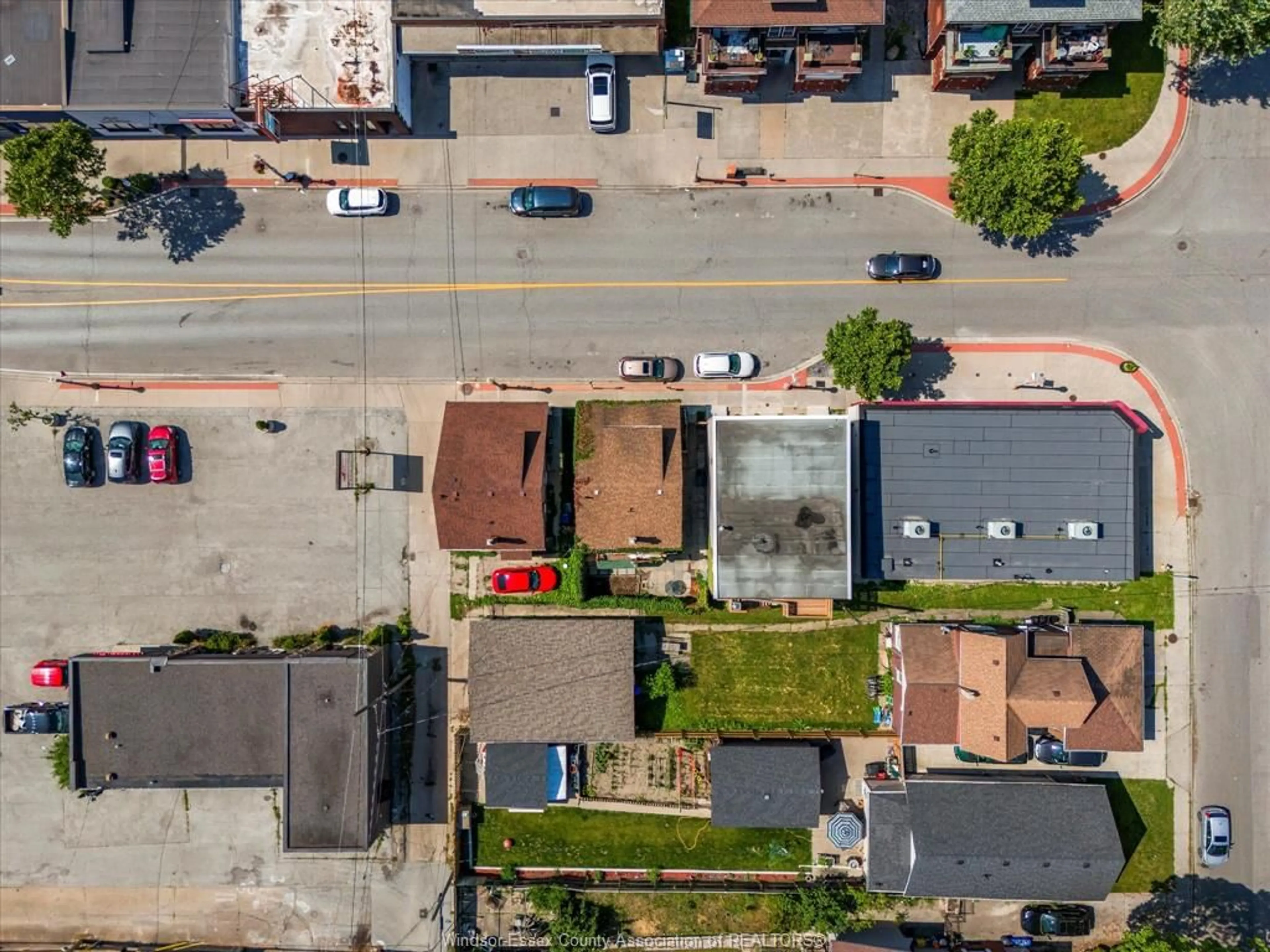 A pic from outside/outdoor area/front of a property/back of a property/a pic from drone, street for 963 Erie St, Windsor Ontario N9A 3Y9