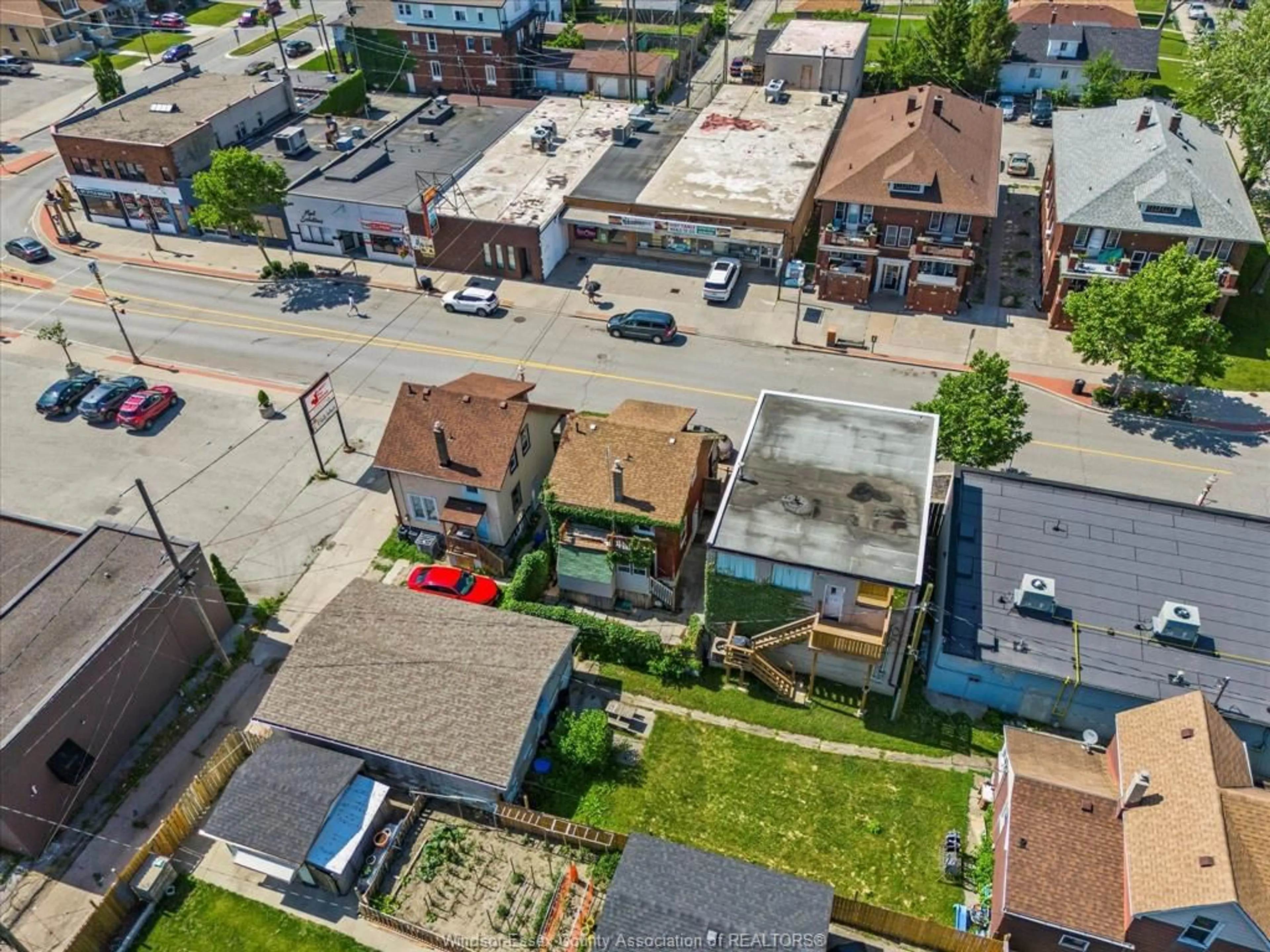 A pic from outside/outdoor area/front of a property/back of a property/a pic from drone, street for 963 Erie St, Windsor Ontario N9A 3Y9