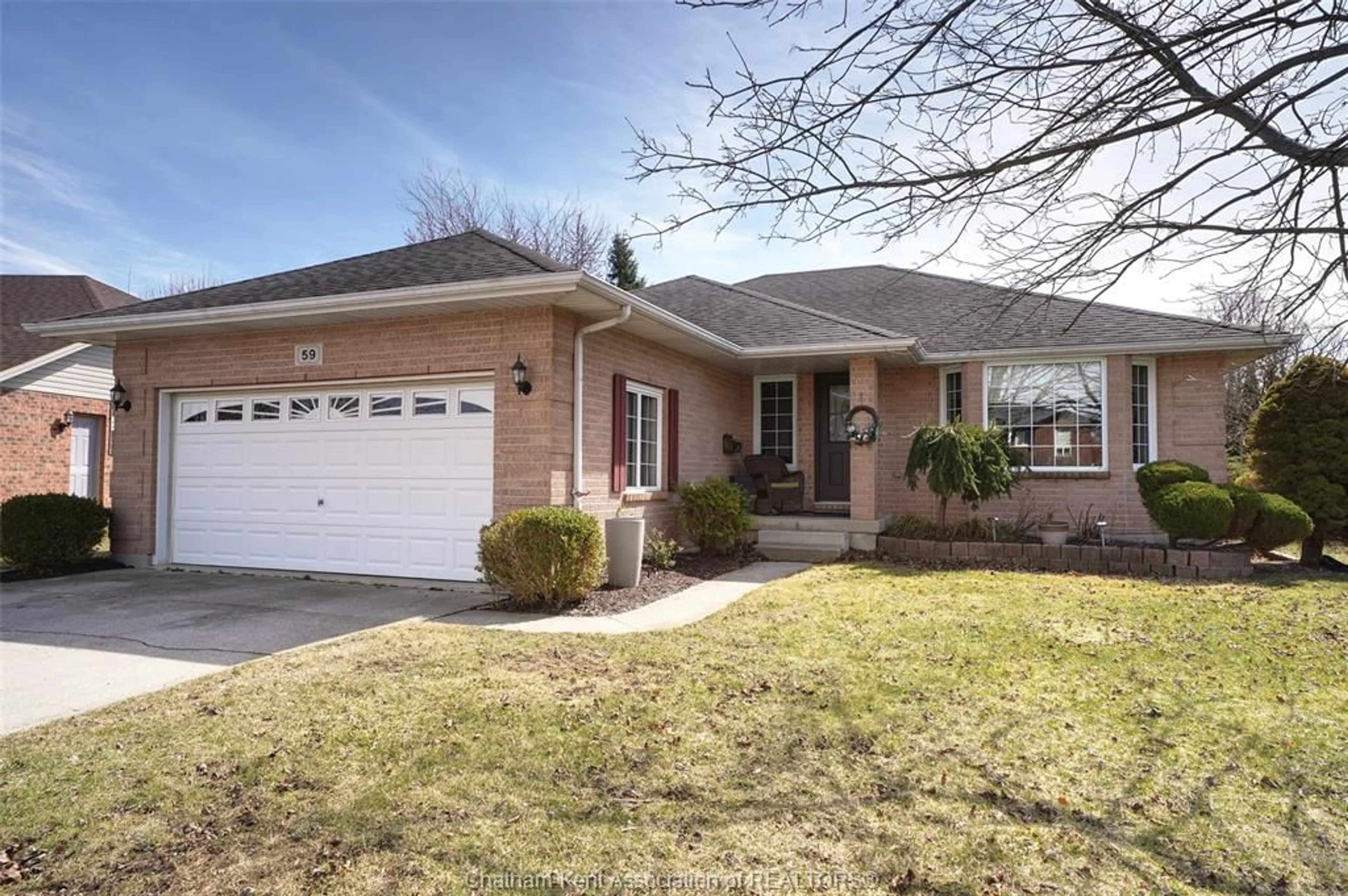 Home with brick exterior material, street for 59 Blossom Pl, Chatham Ontario N7L 5L4