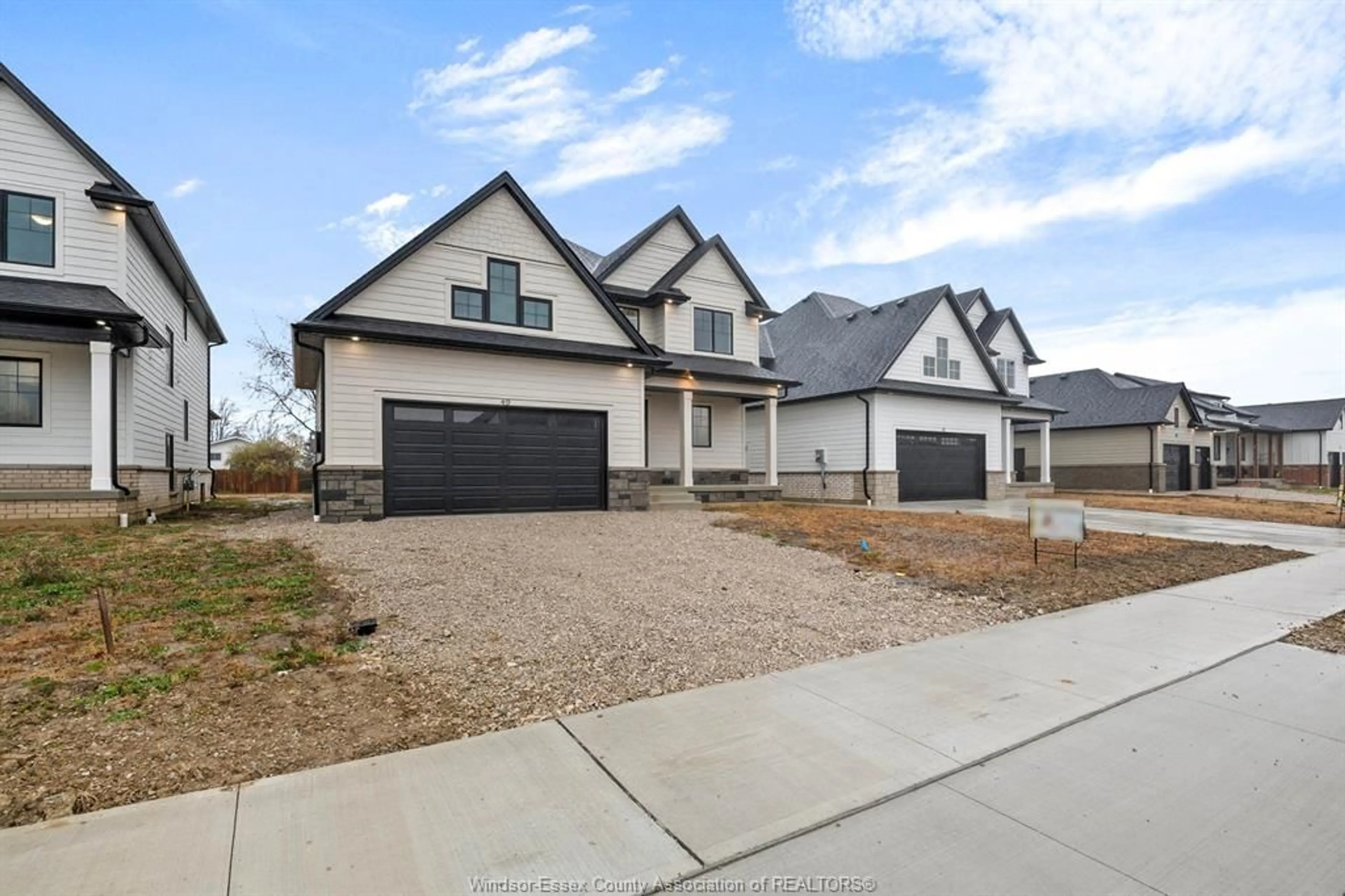 Home with brick exterior material, street for 49 BELLEVIEW Dr, Kingsville Ontario N0R 1B0