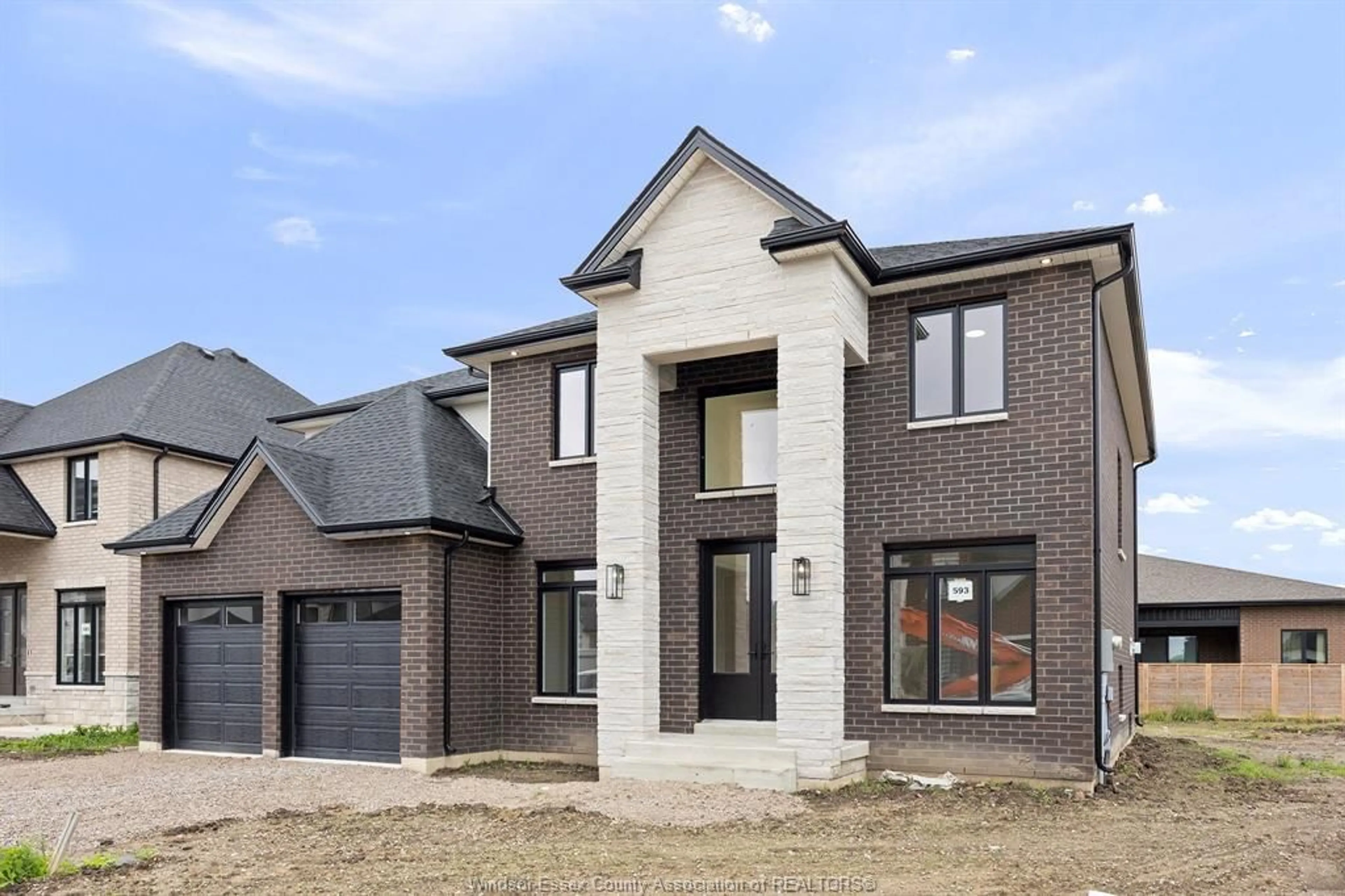 Home with brick exterior material, street for 593 ORCHARDS Cres, Windsor Ontario N9E 0B3